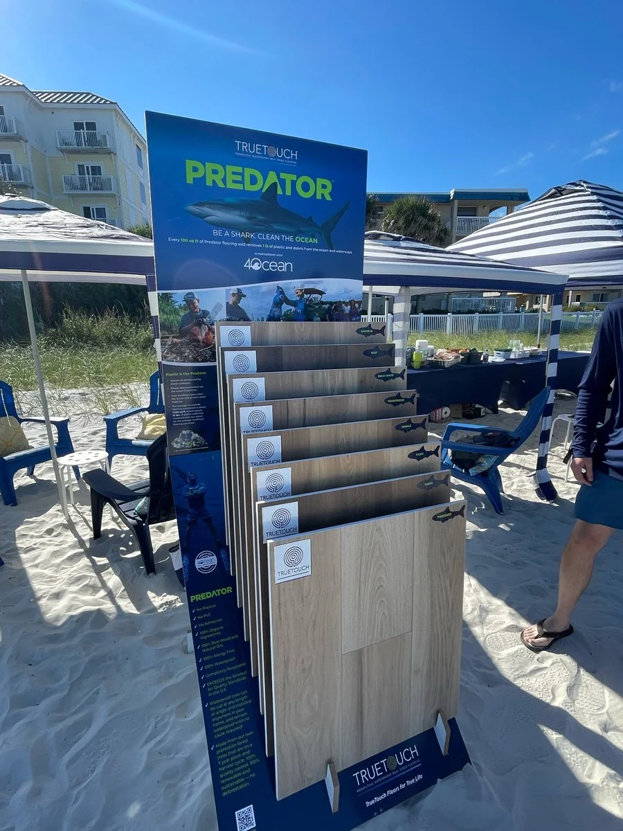 MonoTech Predator display at beach cleanup