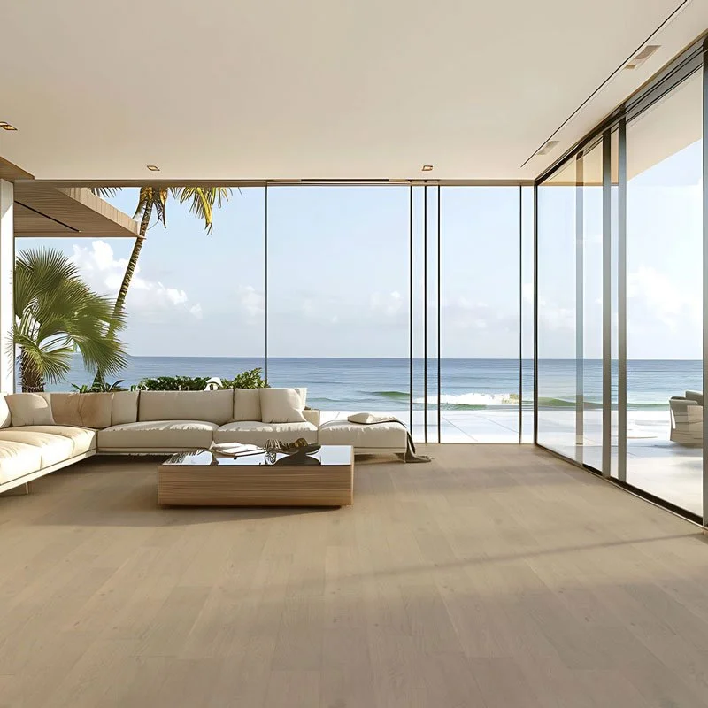 Living room with view of the ocean showing wood floors installed
