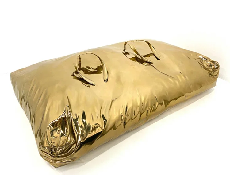  Blue Republic,  The Internationale (Bag of Cement) , 2019, 17 x 27 x 6 5/8 in. Lost wax, polished bronze, Georgia Scherman Projects, Toronto Contemporary Syndicate. 