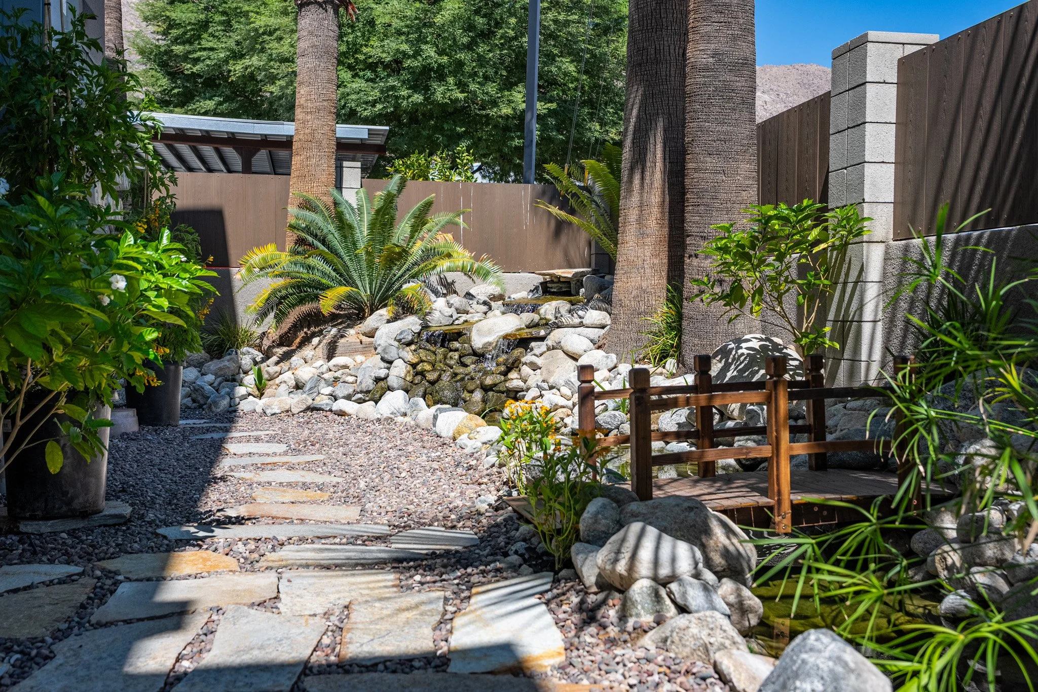 29 koi-pond-waterfall-patio-south-palm-springs-condo-querencia-palms-david-weis.jpg