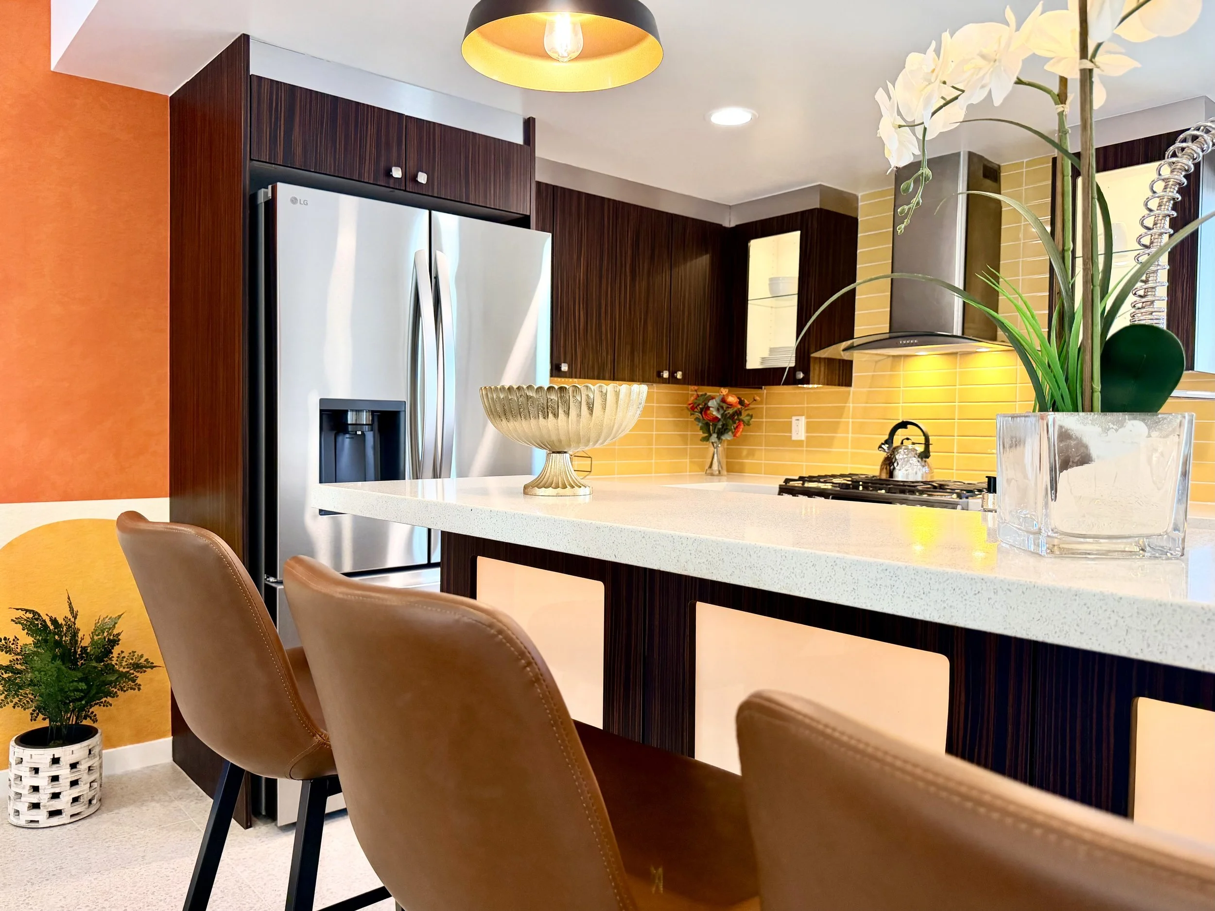3. kitchen dining open layout querencia palms.jpeg