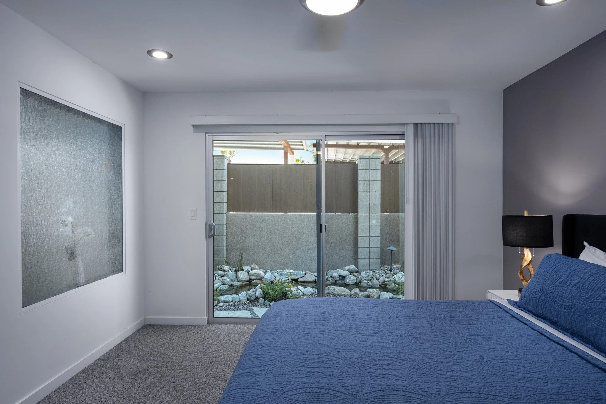 22 querencia-palms-unit-104-second-bedroom-direct-backyard-access.jpg