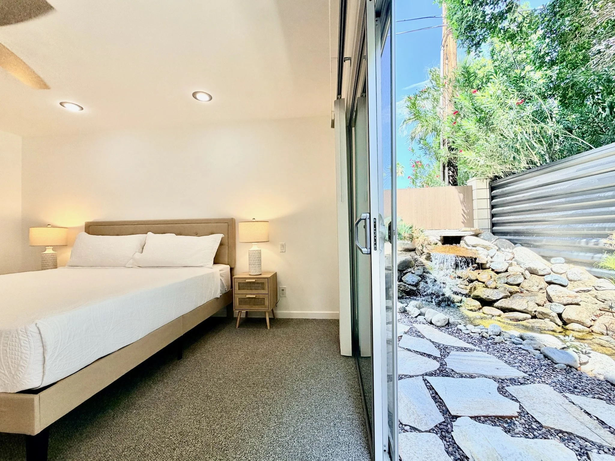 5 primary bedroom patio access.jpeg