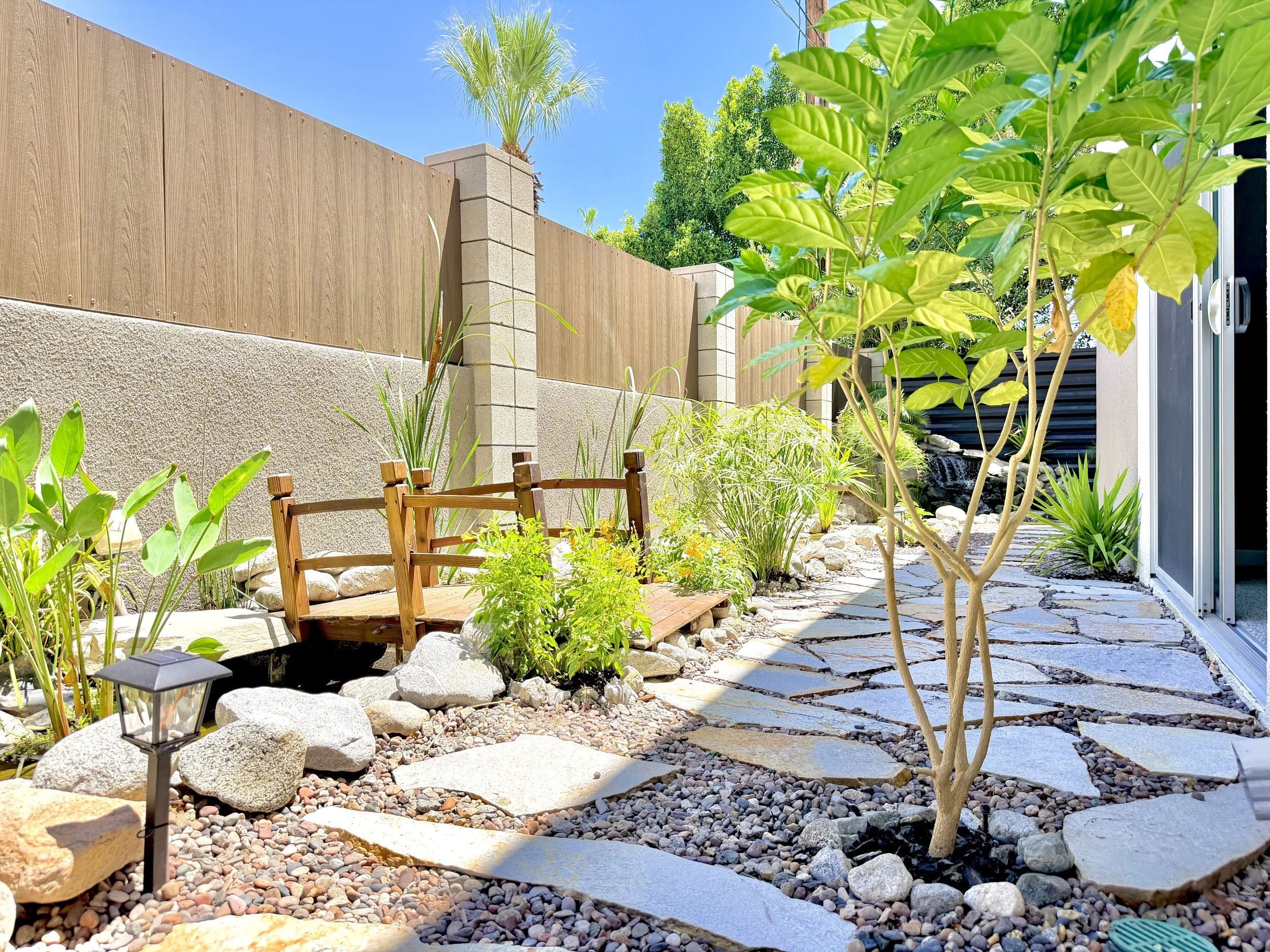 Expansive rear patio private waterfall.jpeg