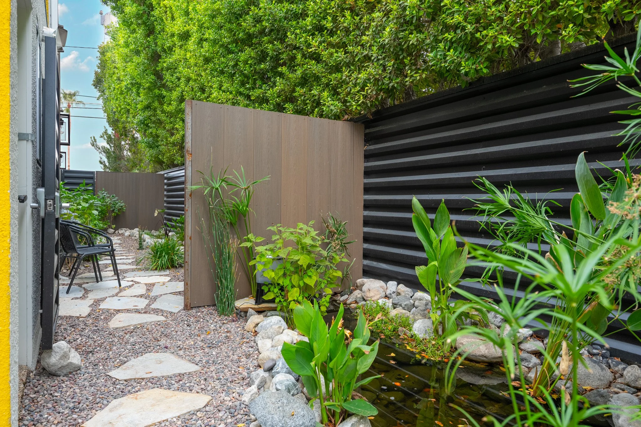 24 koi-pond-patio-seating-area-palm-springs-condo.jpg