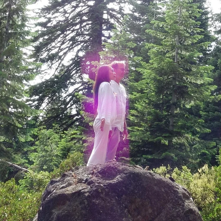 Standing on a sacred rock