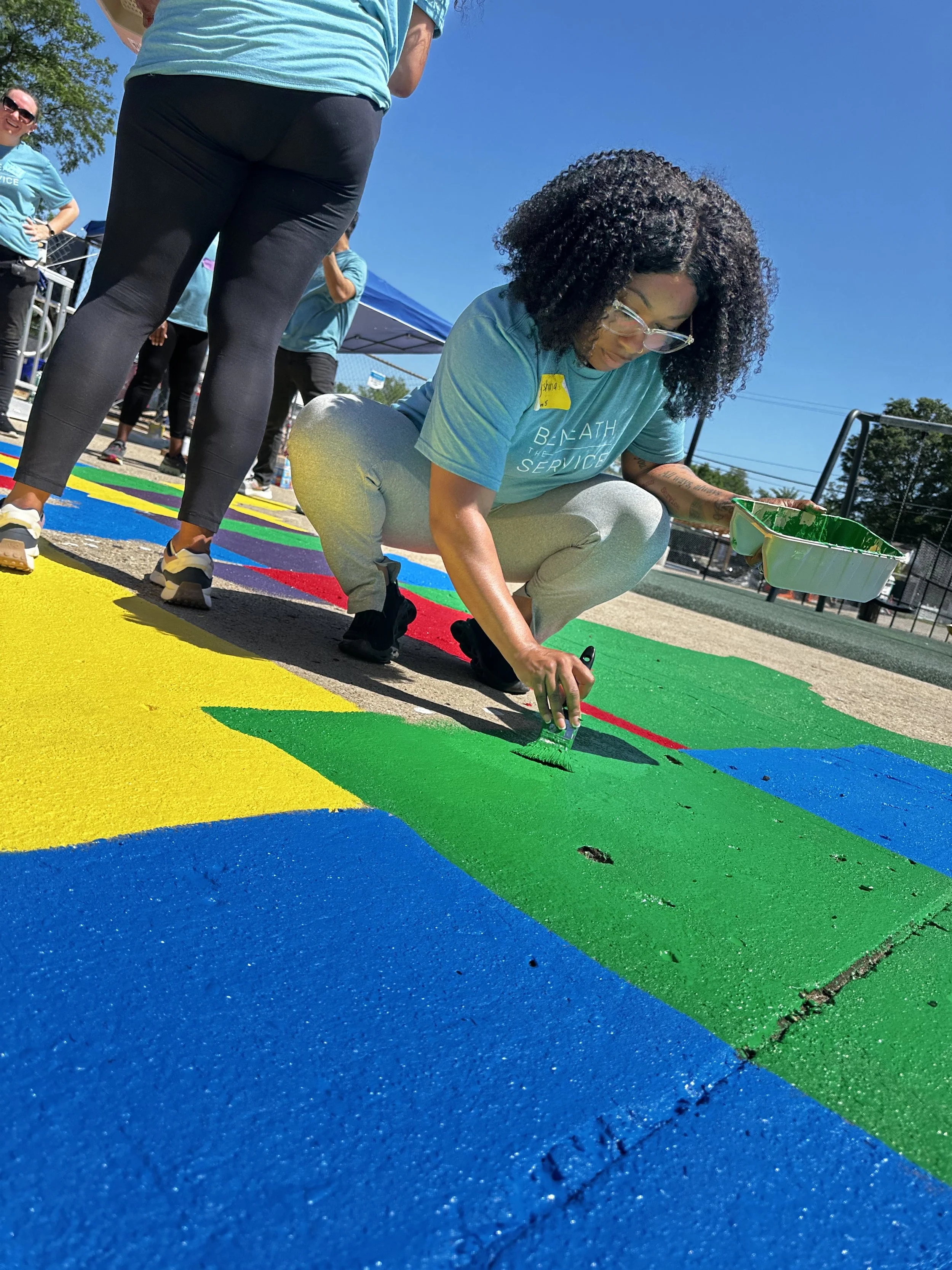 Keyshuna Cole joins the Mission Continues in community event to support beautifying an elementary school.