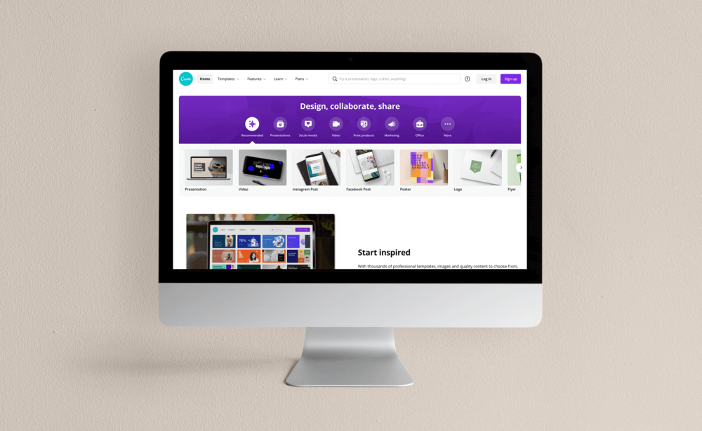 Silver iMac displaying Canva website on neutral tone background