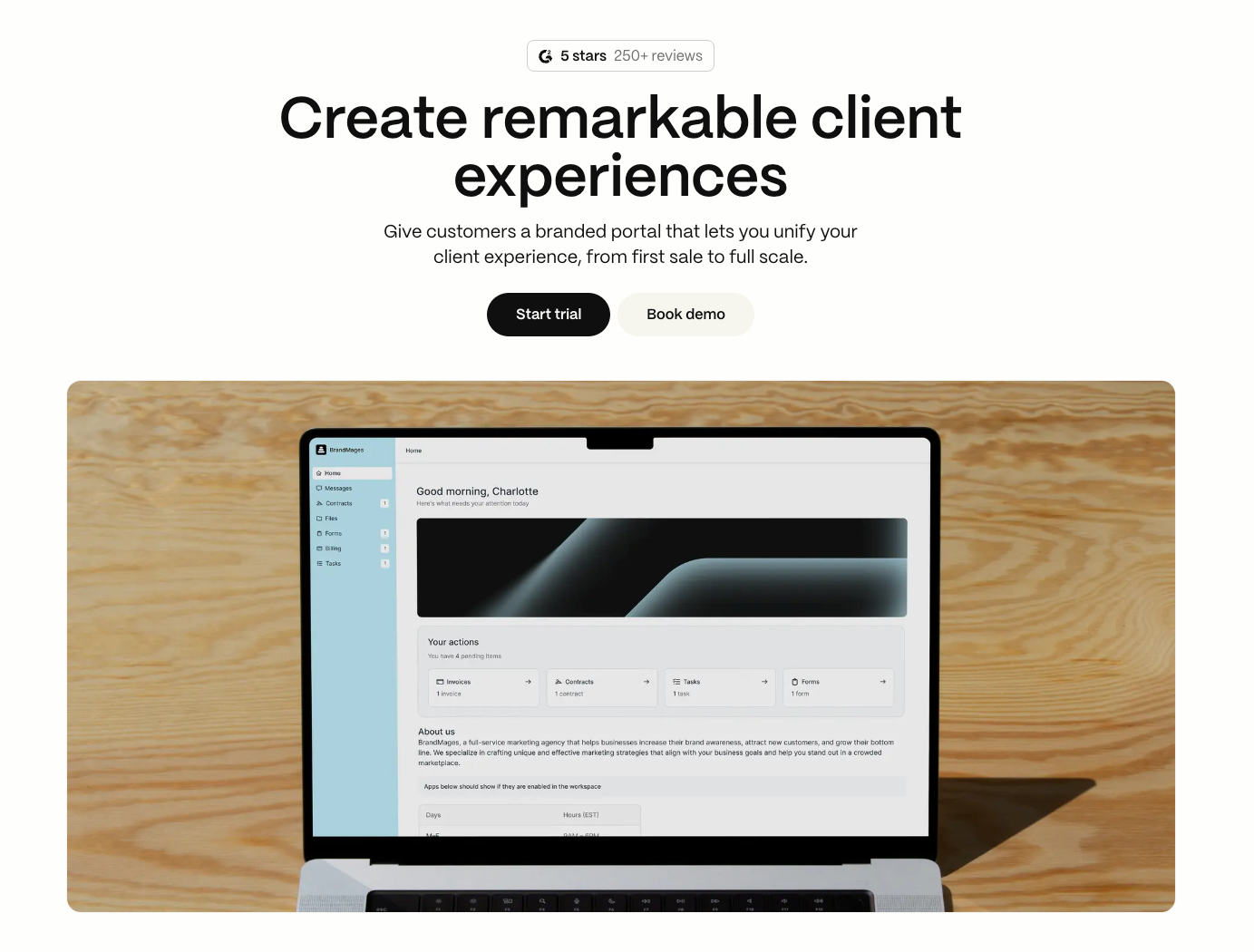 Assembly homepage hero reading “Create remarkable client experiences” above a laptop mock-up of the client portal dashboard, with Start trial and Book demo buttons.