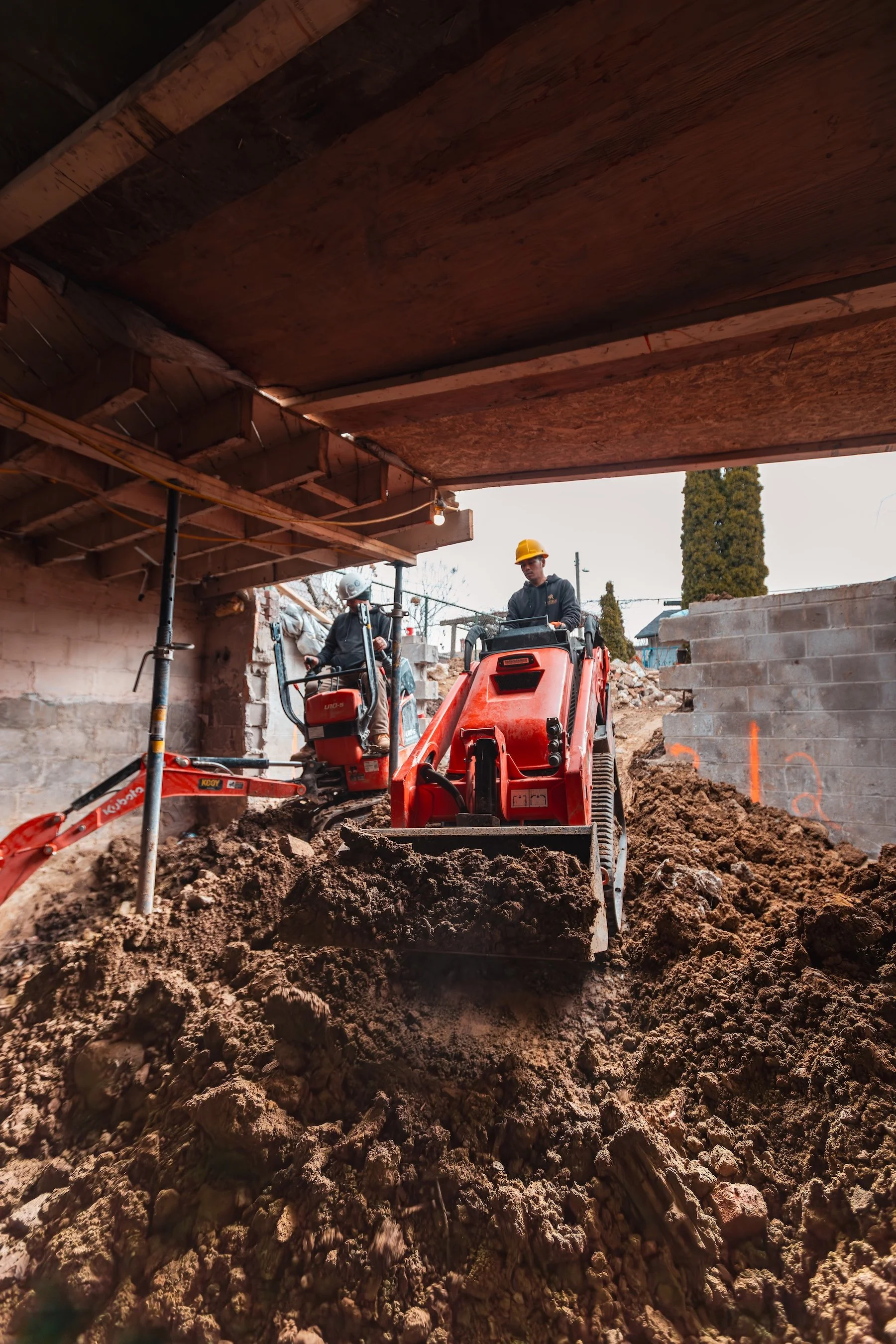 basement-underpinning-mini-excavator-soil-removal.jpg