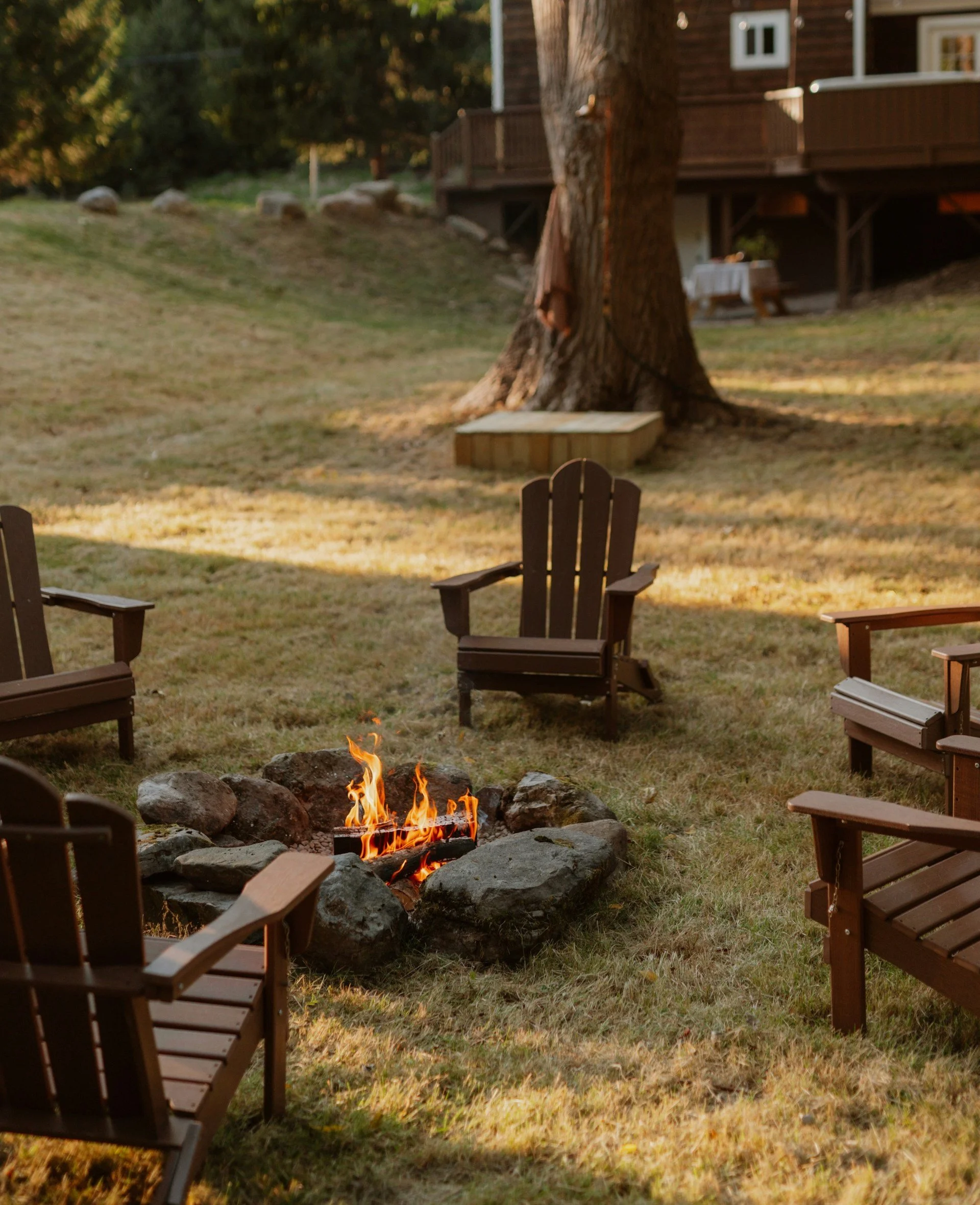 Luxury backyard patio with pool, deck and outdoor seating area showing a complete outdoor living space