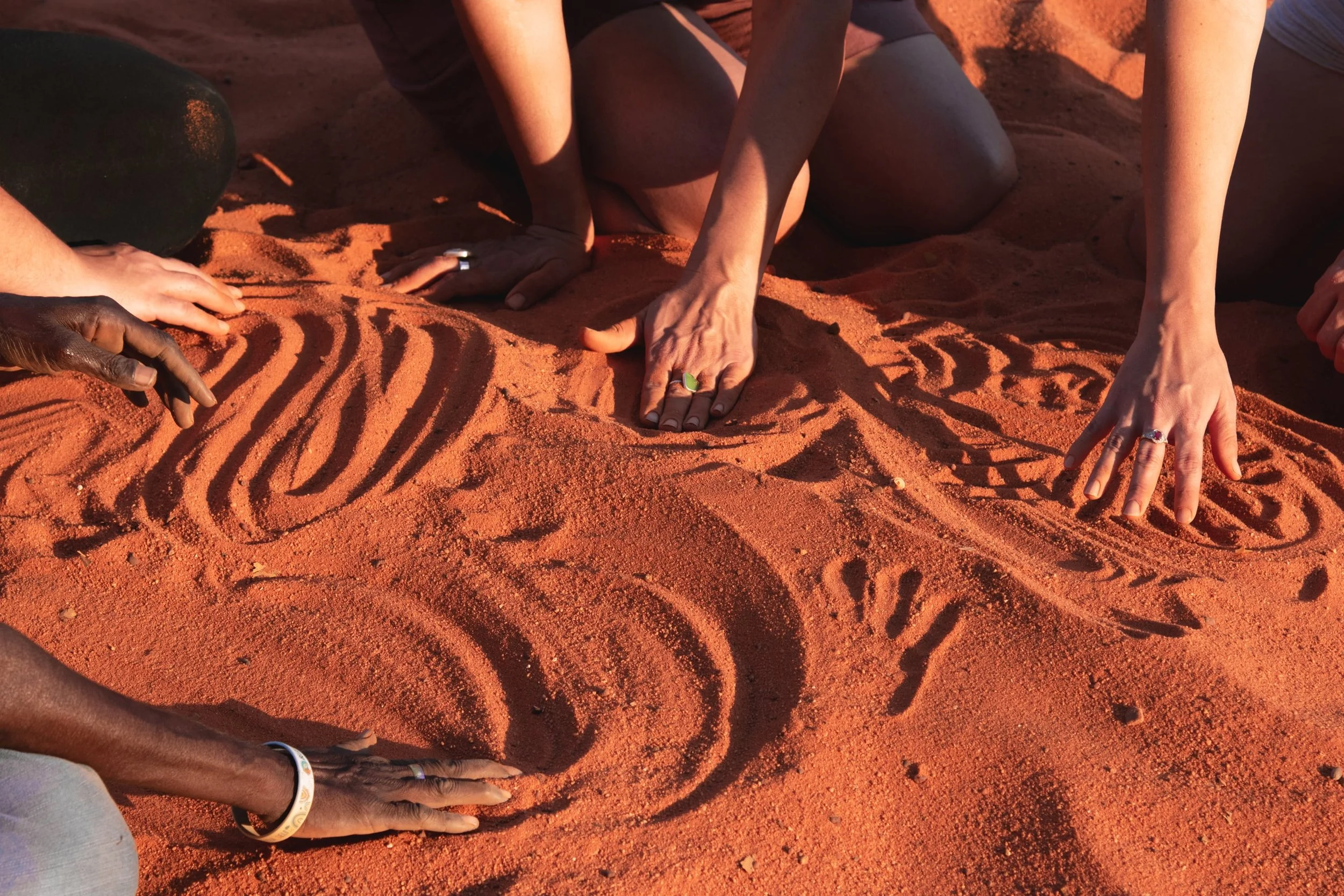 hands-playing-sand-heritage.jpg