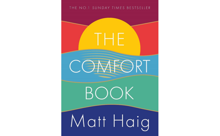 Cover of The Comfort Book by Matt Haig. Has the words "The No. 1 Sunday Times Bestseller" at the top. With a graphic of the sunset or sunrise.
