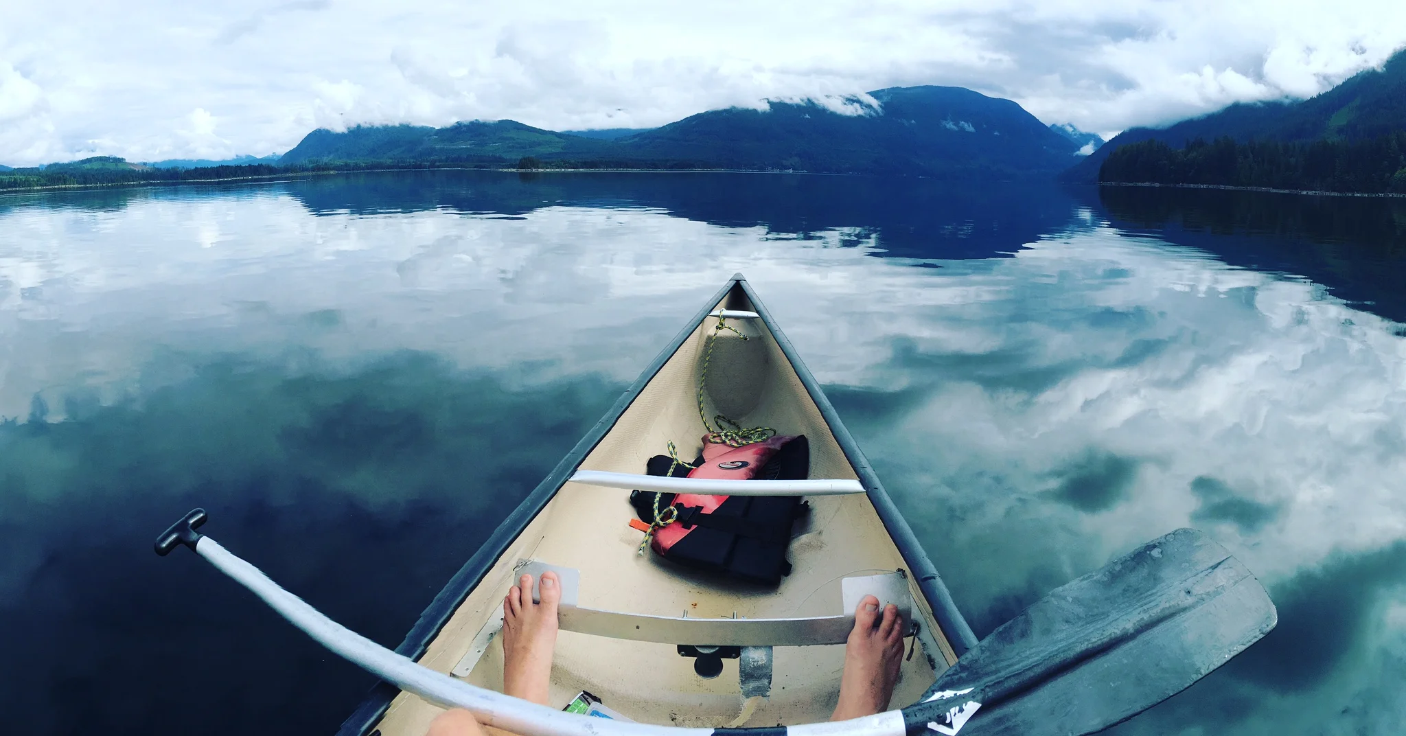 Solo Canoeing on Lois Lake, qathet, British Columbia.jpeg