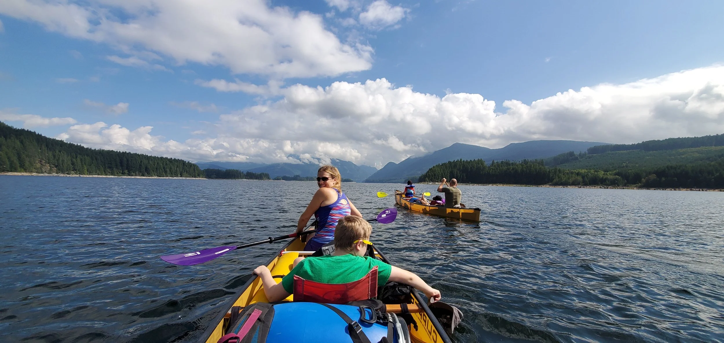 Canoes paddling on Powell Lake in qathet BC