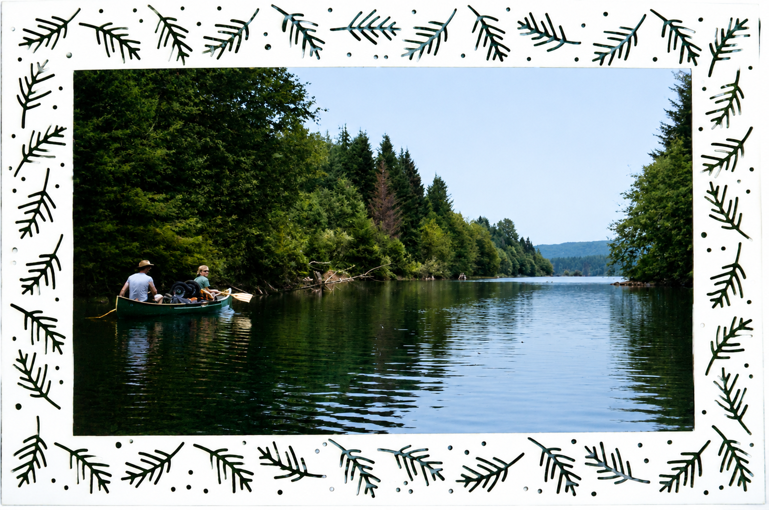 two people paddling a Scott canoe on Fry Lake in Sayward