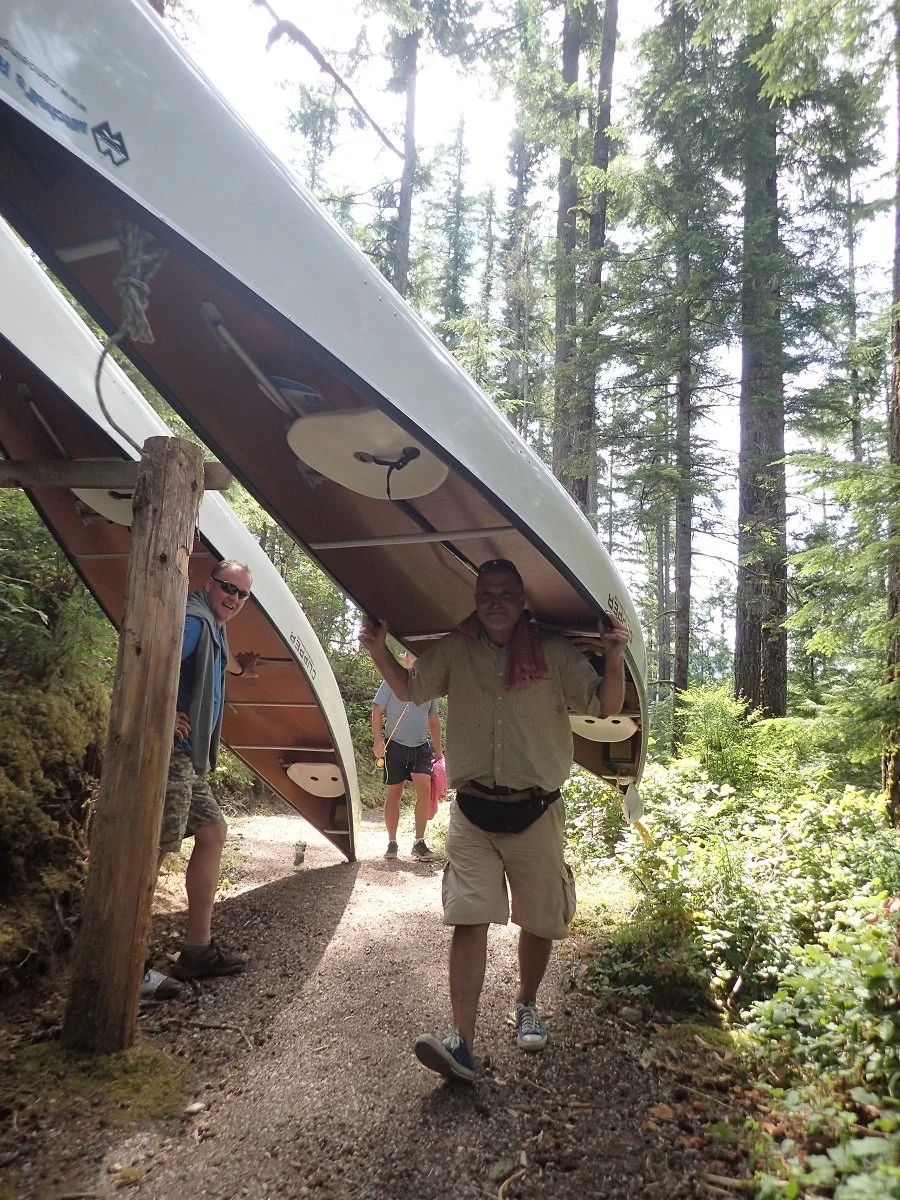 Overhead portaging on the qathet Canoe Route