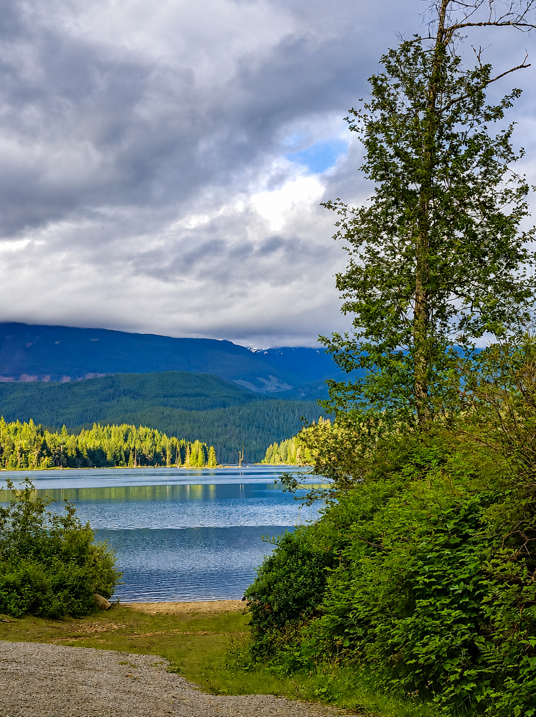 View from shore, over a lake towards mountains