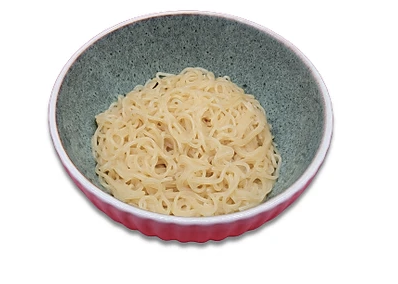 A bowl of shirataki noodles on a white background.