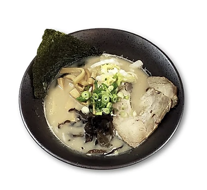 Bowl of tonkotsu ramen with pork, seaweed, scallions, bamboo shoots, mushrooms, and creamy broth.