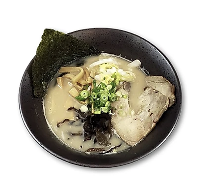 Bowl of ramen with sliced pork, seaweed, green onions, bamboo shoots, mushrooms, and creamy broth.