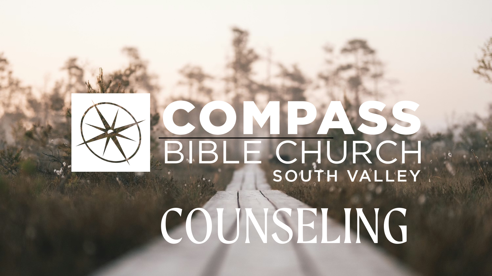 Banner for Compass Bible Church South Valley featuring a wooden pathway through a field with trees in the background, and the church's logo of a compass.