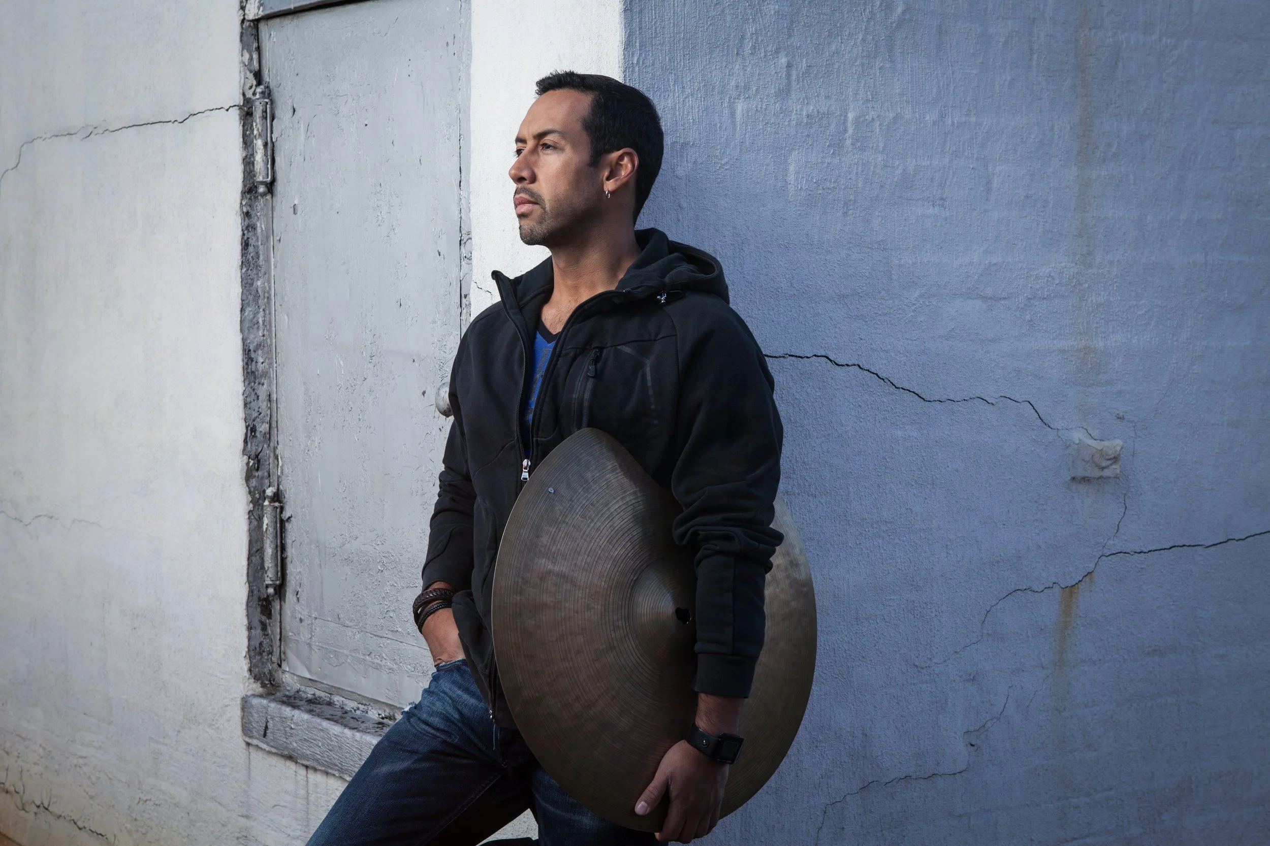 Photo - Antonio Sanchez roof shot w_ cymbal.jpg