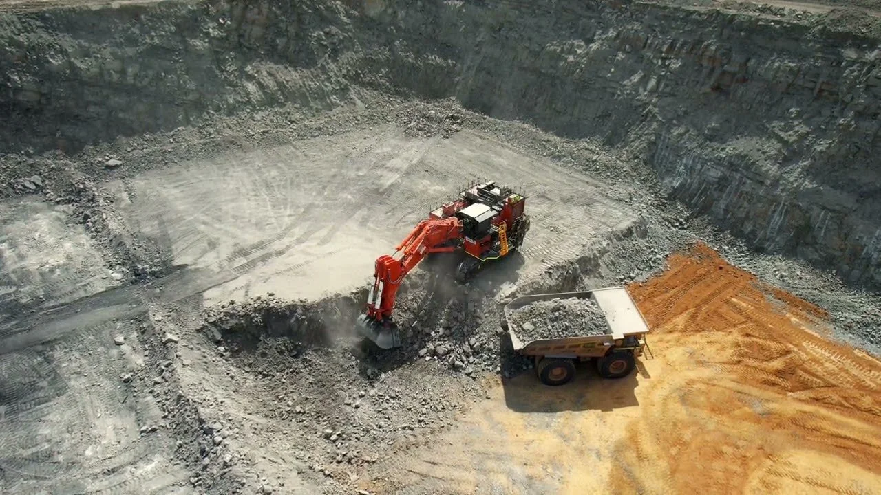 Digger loading haul truck