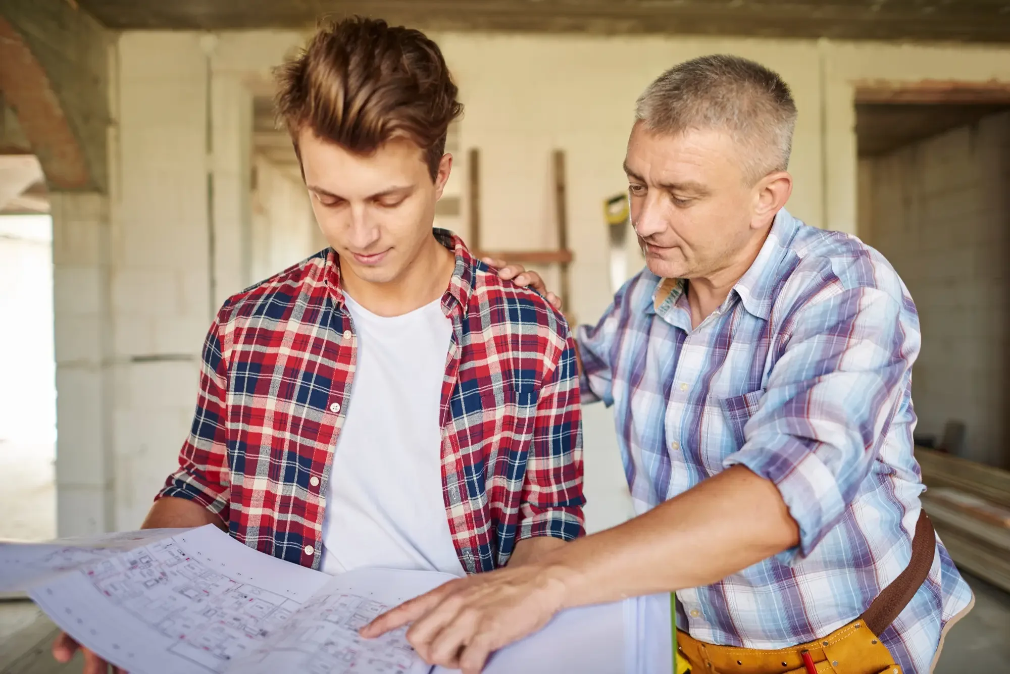 two men planning and executing a new custom home