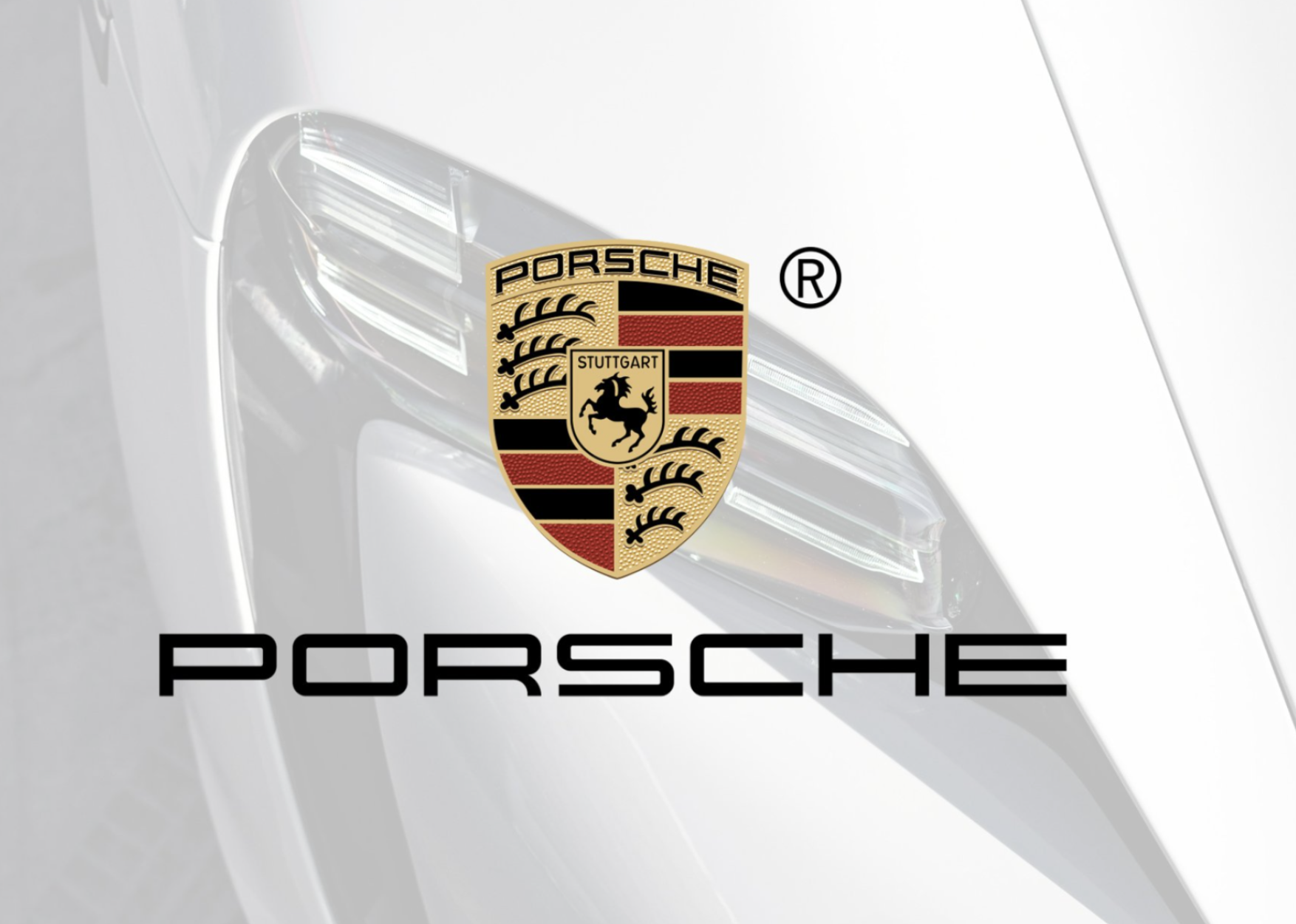 Porsche logosu ve beyaz bir spor araba farı.