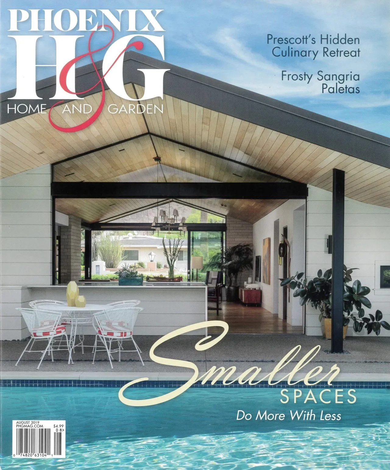 Cover of Phoenix Home & Garden magazine, August 2019, featuring a modern outdoor living space with a pool, patio furniture, and a view into a stylish interior. Headline text reads: "Smaller Spaces: Do More With Less" and mentions "Prescott’s Hidden Culinary Retreat" and "Frosty Sangria Paletas."