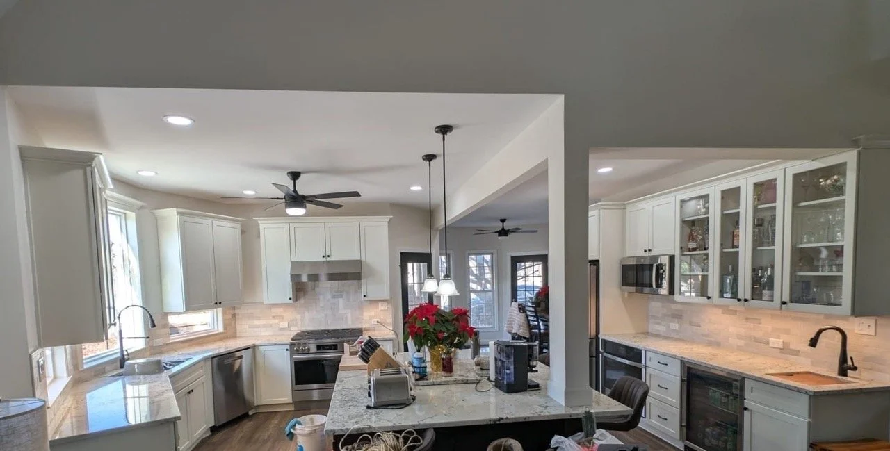 Sleek gray cabinet kitchen with island and stainless steel appliances in Nazareth, PA remodeled by Mr. Handyman.