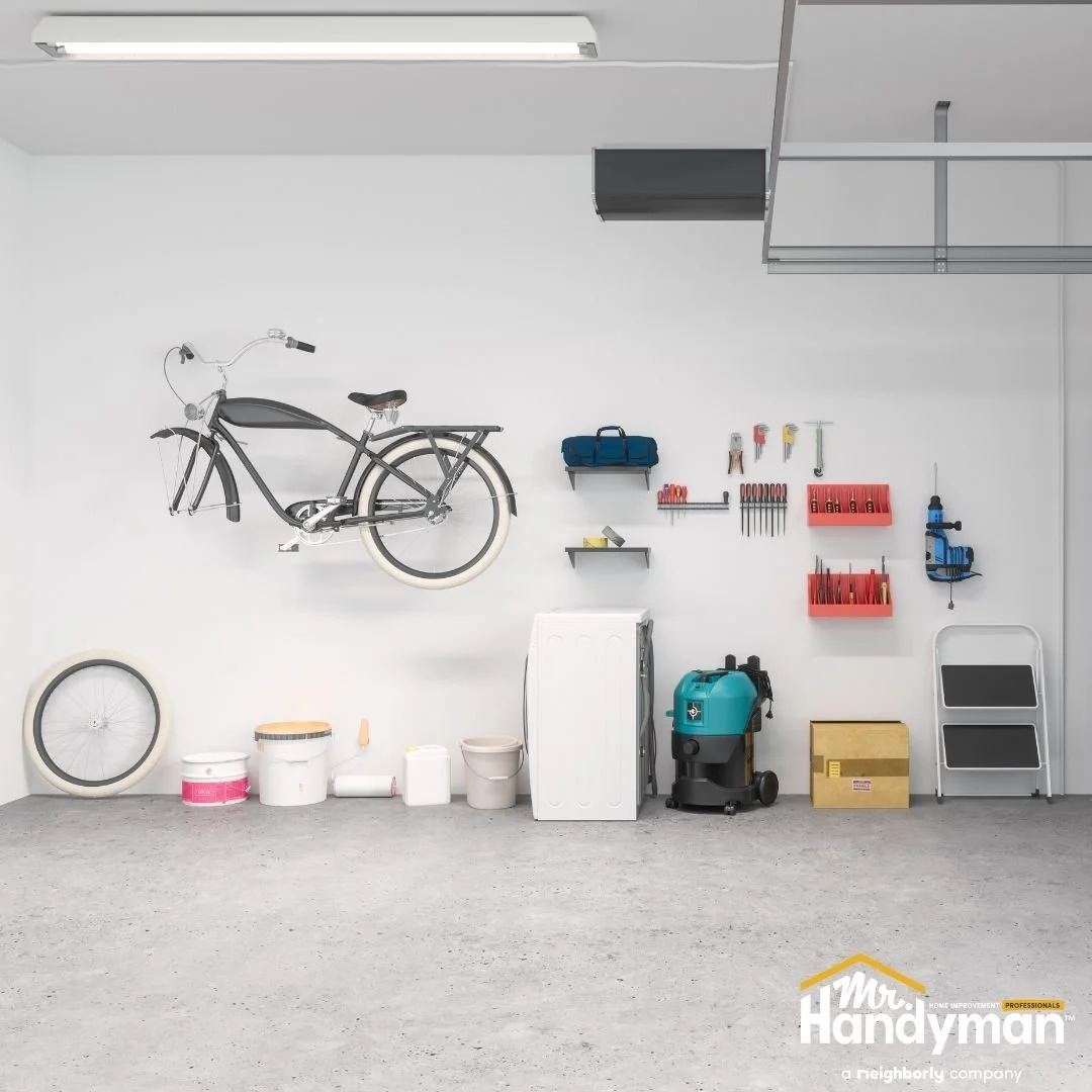 Garage wall storage system with mounted tools and equipment, garage organization by Mr. Handyman of Lehigh Valley