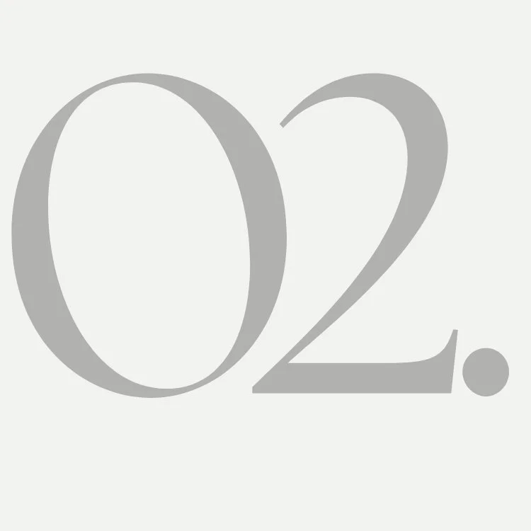 Large gray number 02 on a light gray background.