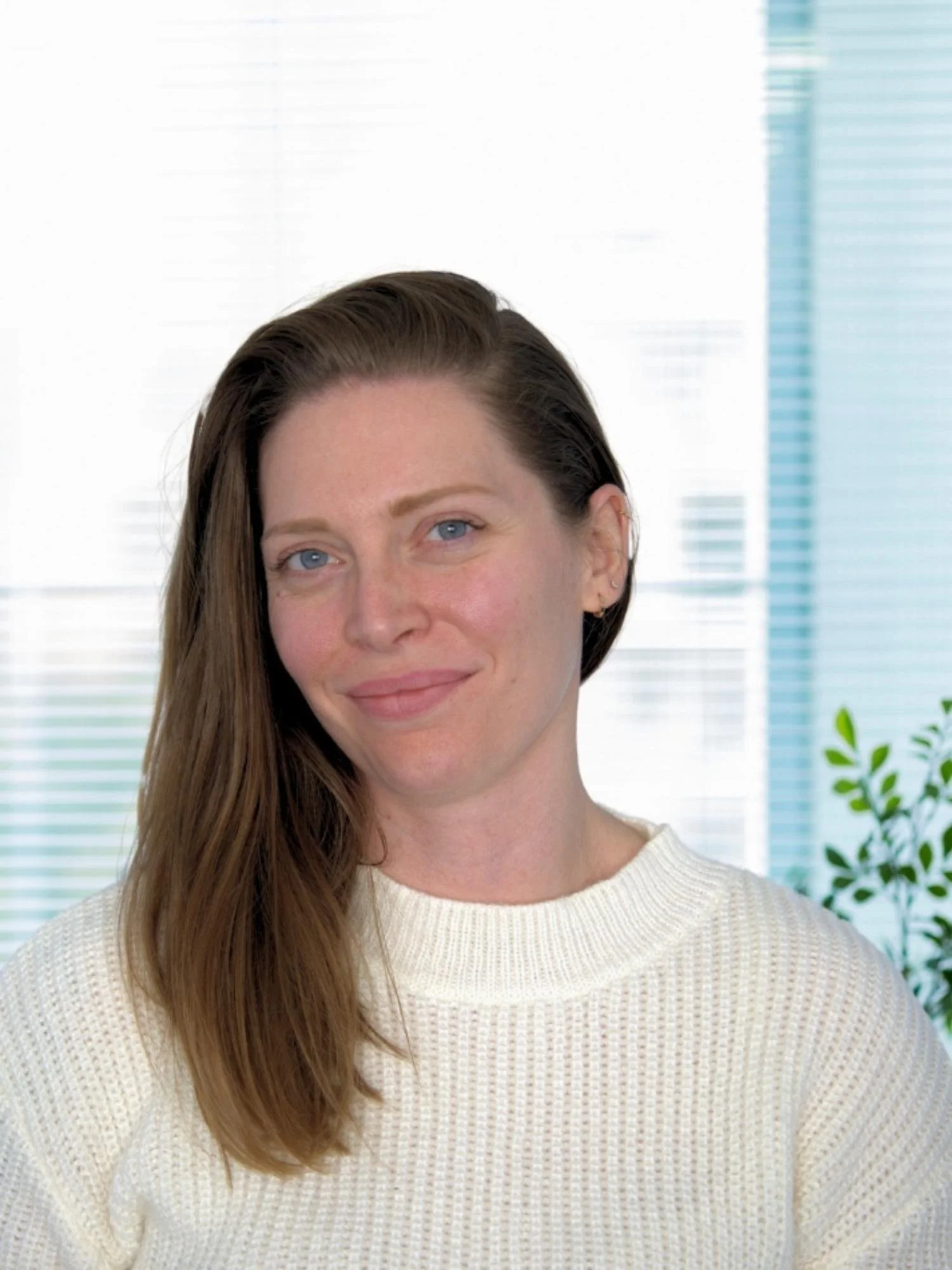 A headshot of Stacey Potter, Family Photographer in her office in Mandurah