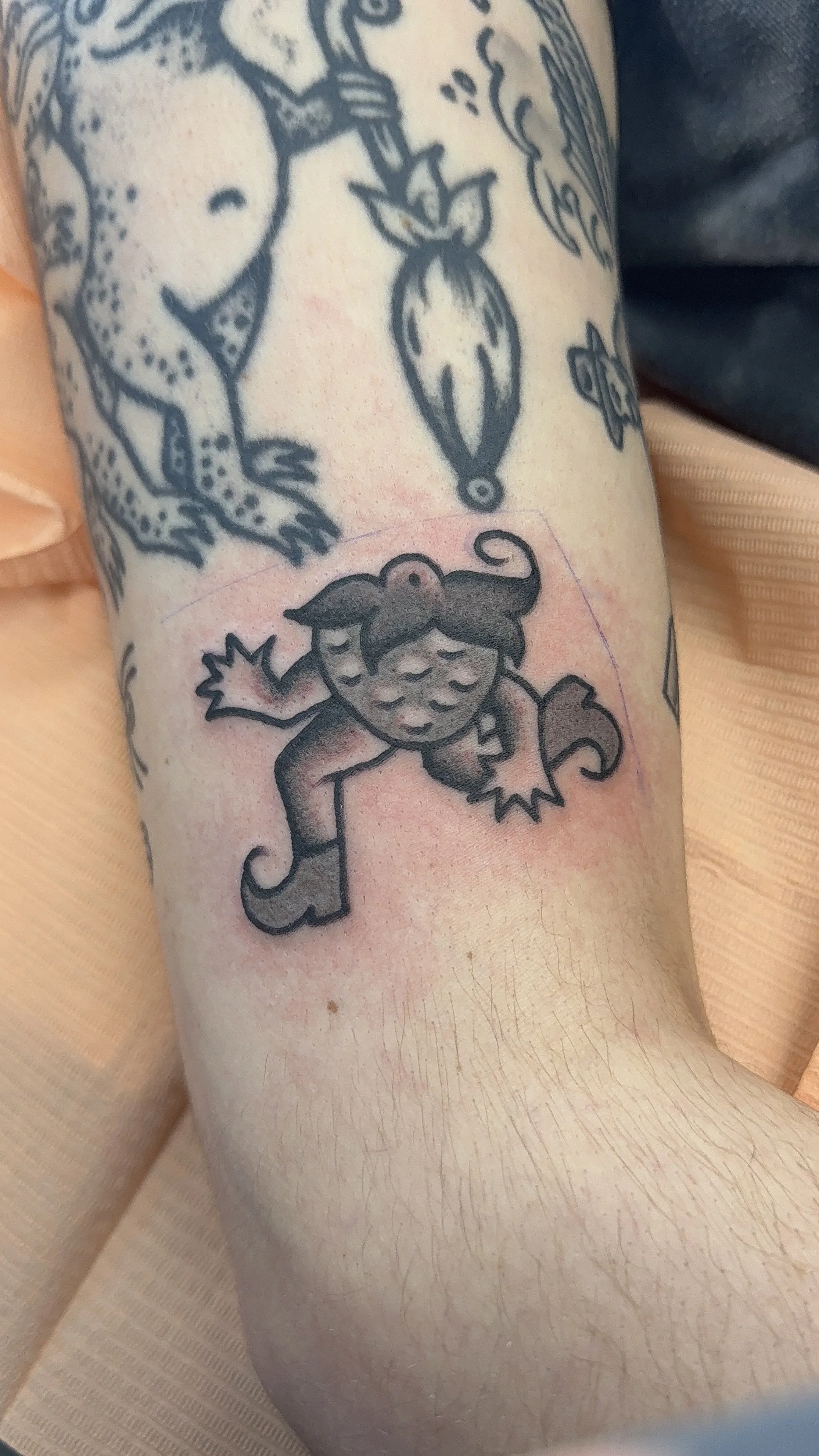 american traditional style strawberry man tattoo