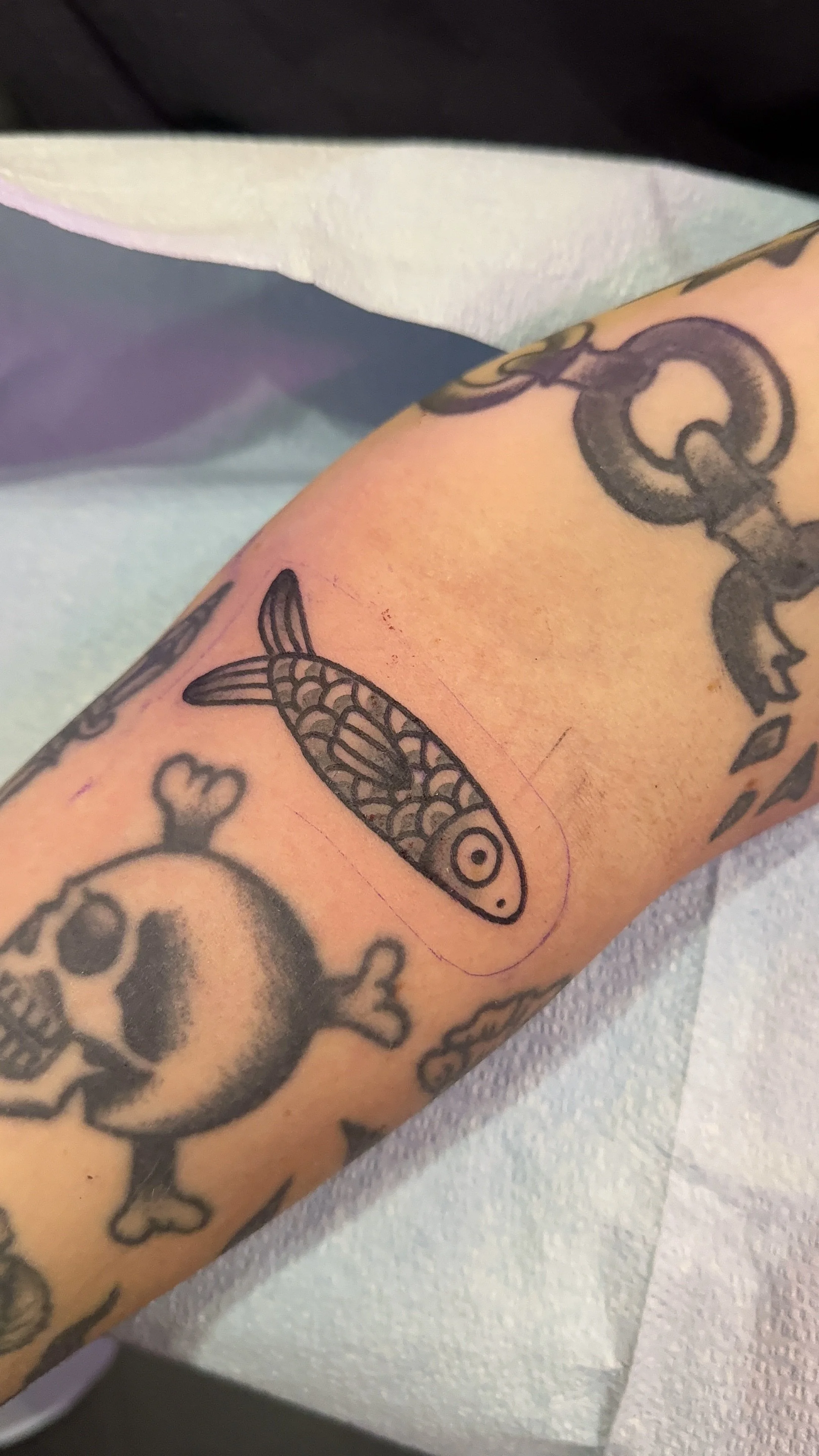 little sardine tattoo small fish tattoo american traditional style