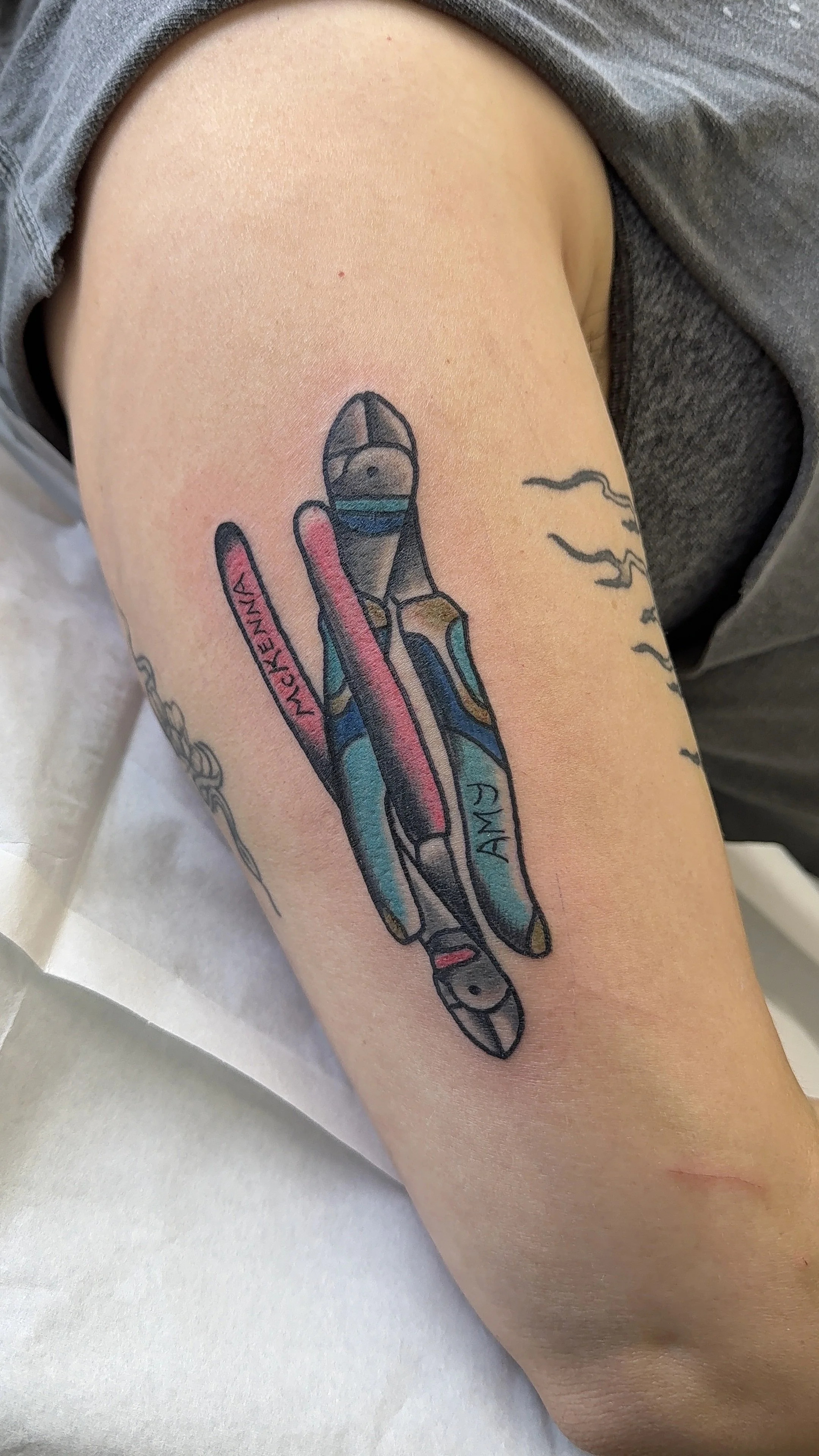 Lesbian scissoring electrician  tattoo 