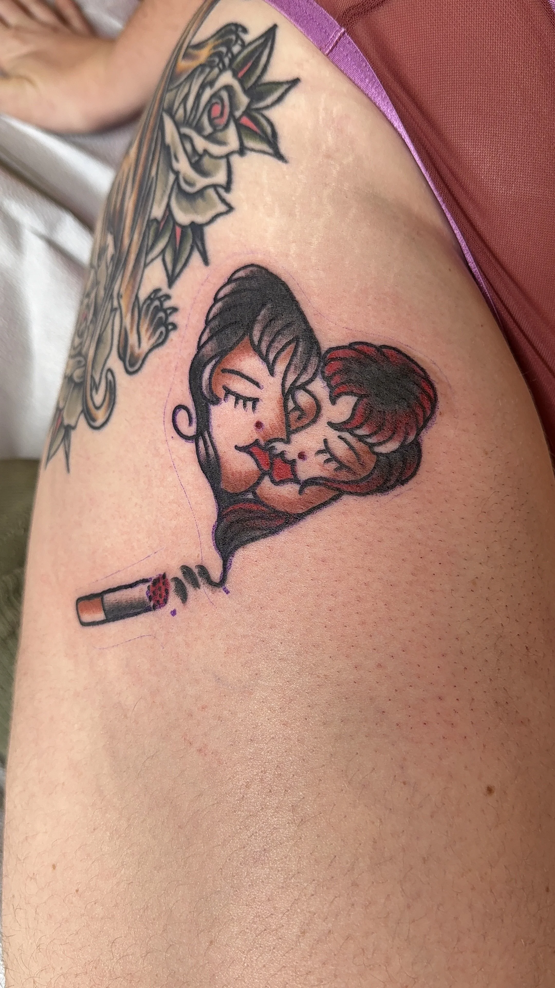Tattoo of two women kissing. Gay lesbian tattoo. 