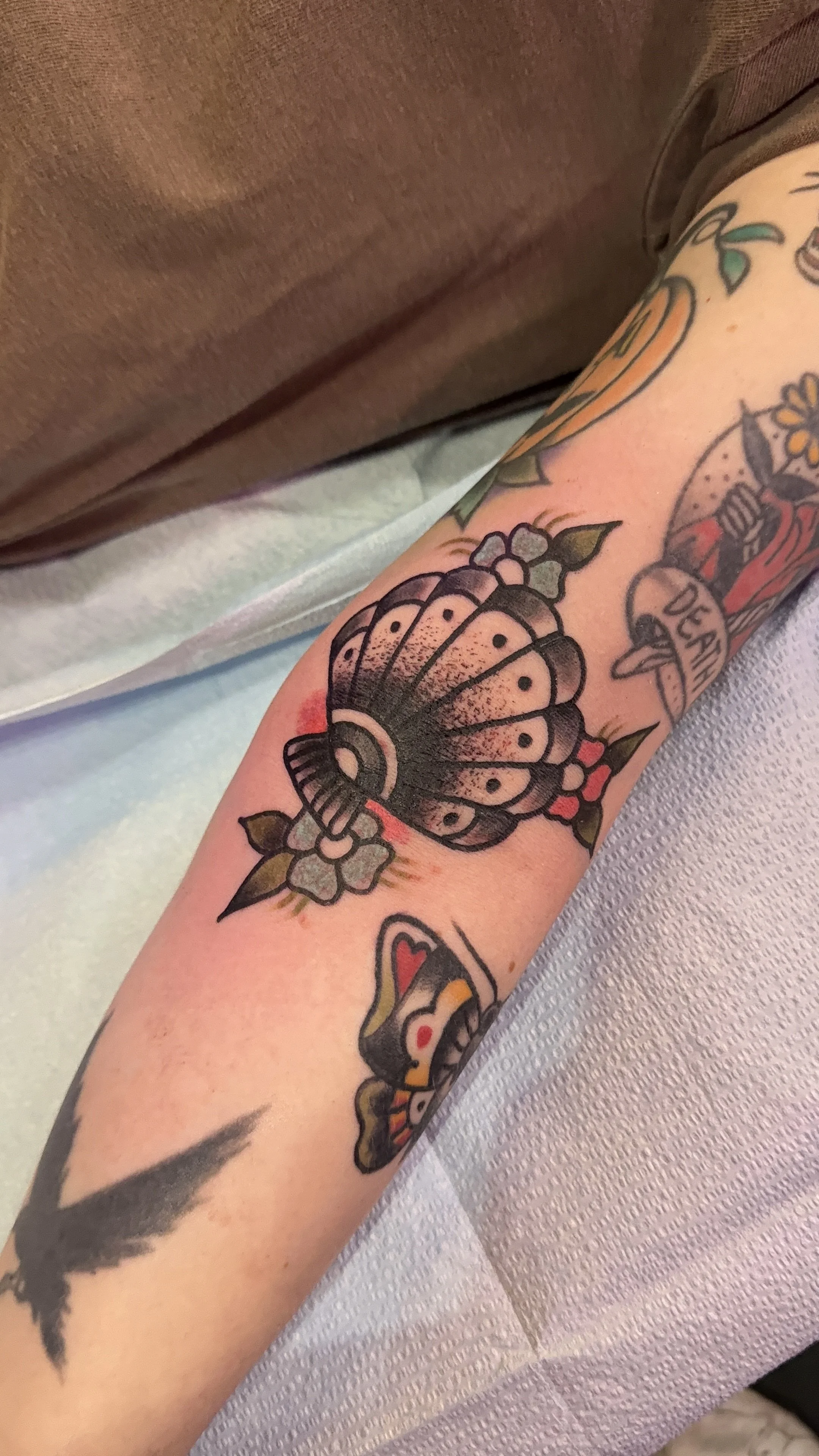 seashell tattoo american traditional style