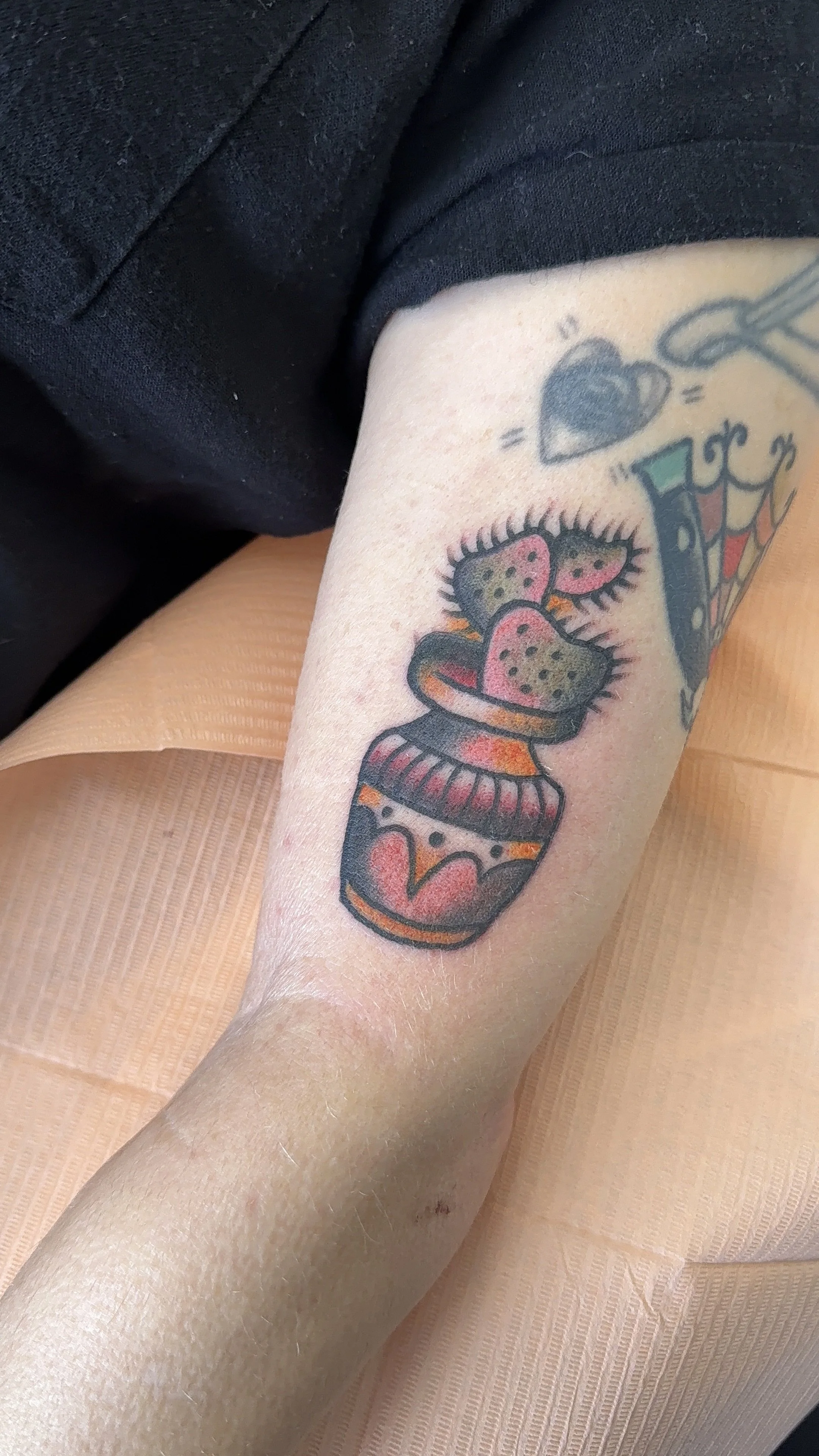 heart shaped cactus tattoo american traditional style