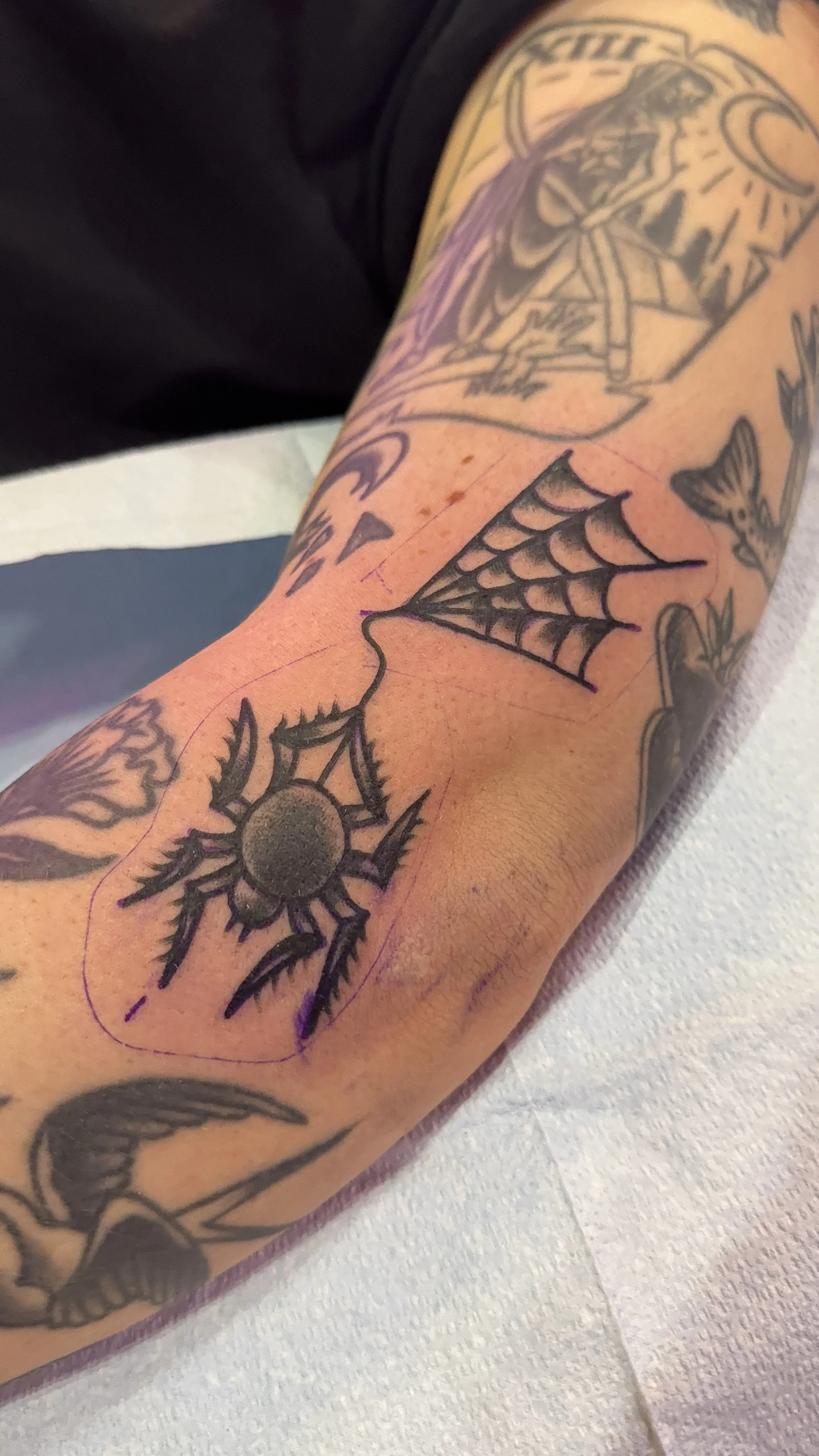 black and grey spiderweb and spider tattoo american traditional style