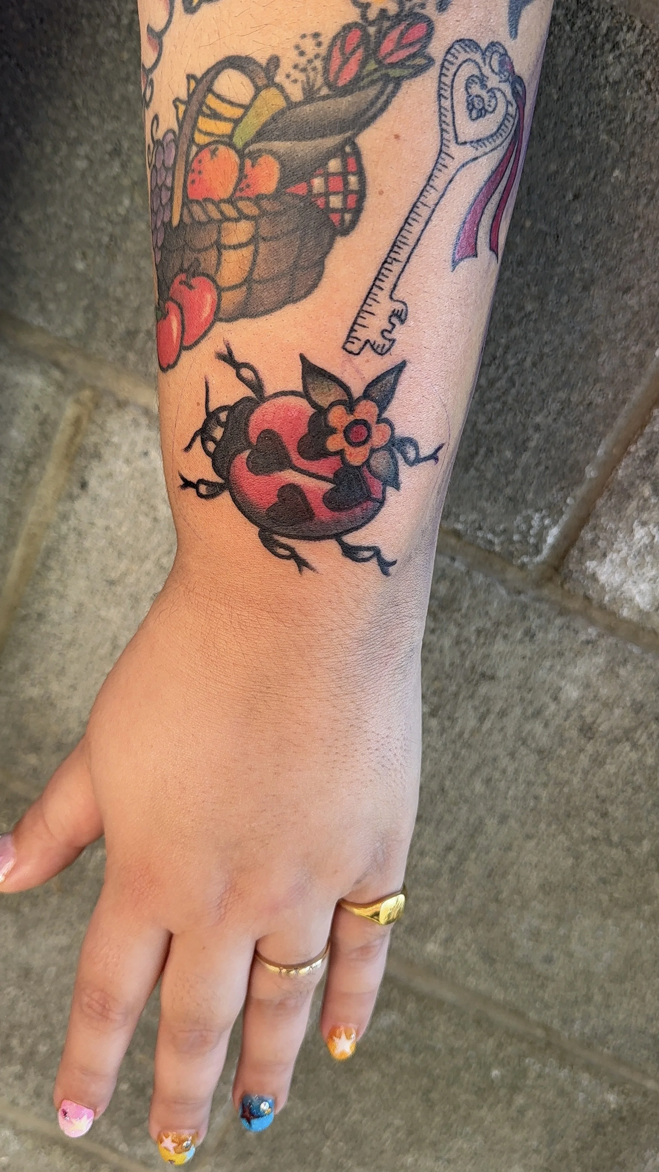 ladybug small tattoo american traditional style