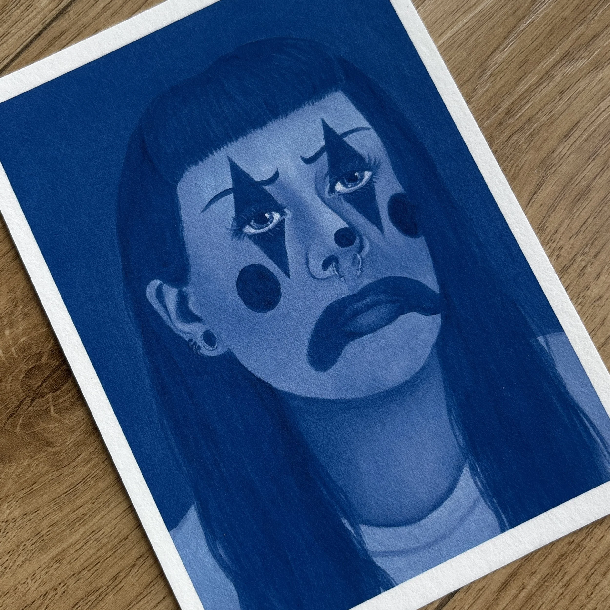 blue clown print close up flat lay.jpg