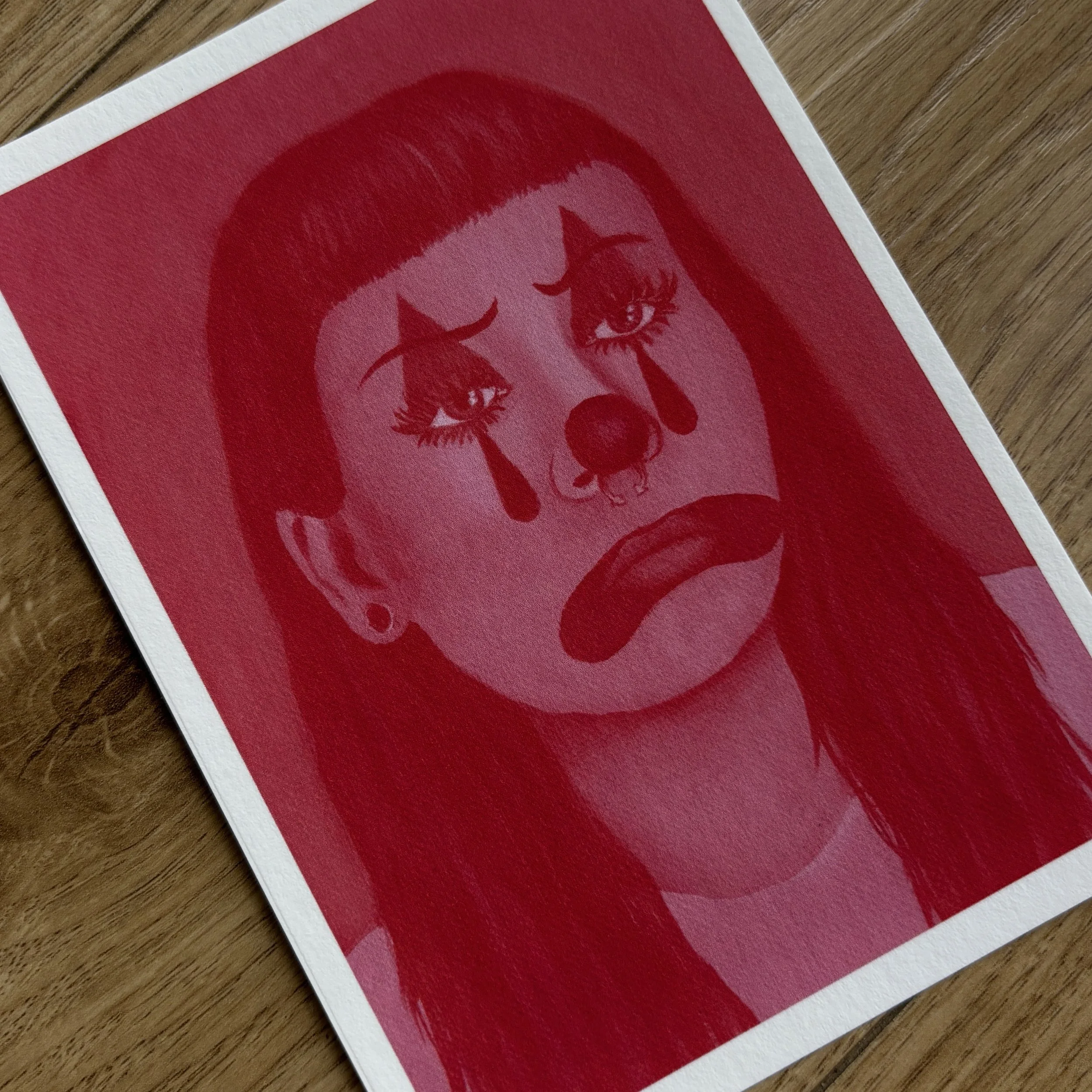 pink clown print close up flat lay.jpg