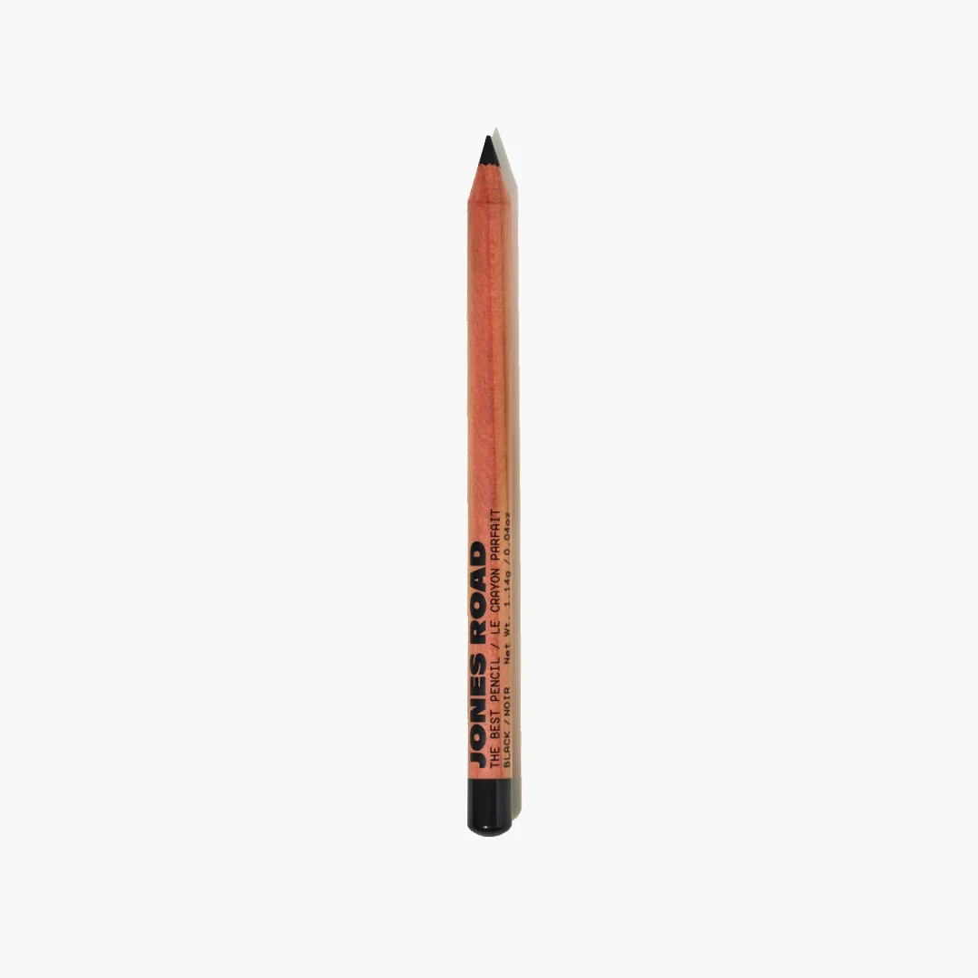  Jones Road “The Best Pencil” eyeliner in classic black, sharpened wooden pencil standing upright against a white background. 