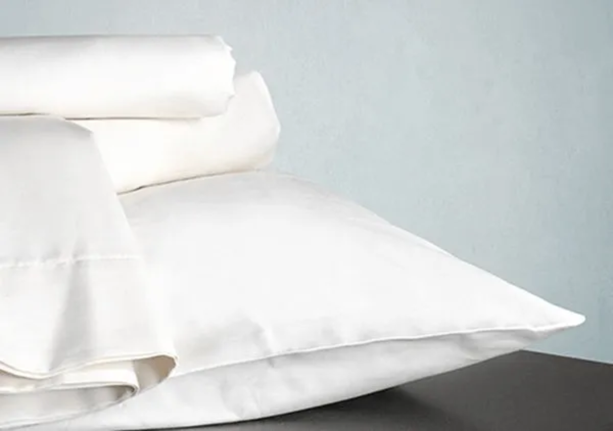 SOL Organics white organic cotton sheet set.