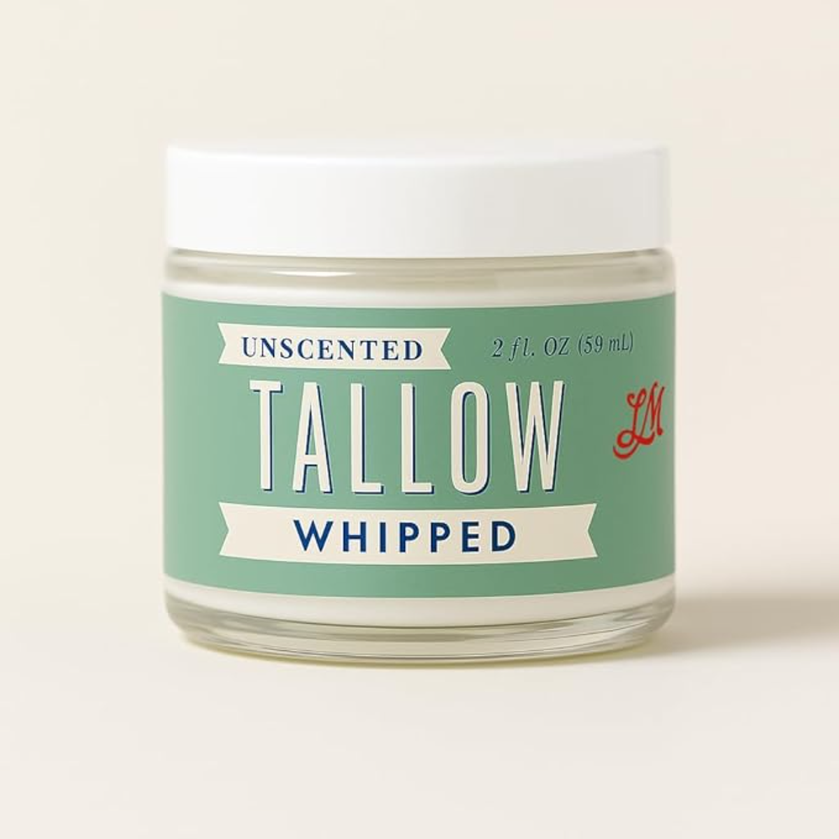 Lady May Whipped Unscented Tallow, 2-oz glass jar with a white lid and mint-green label displayed against a neutral background.