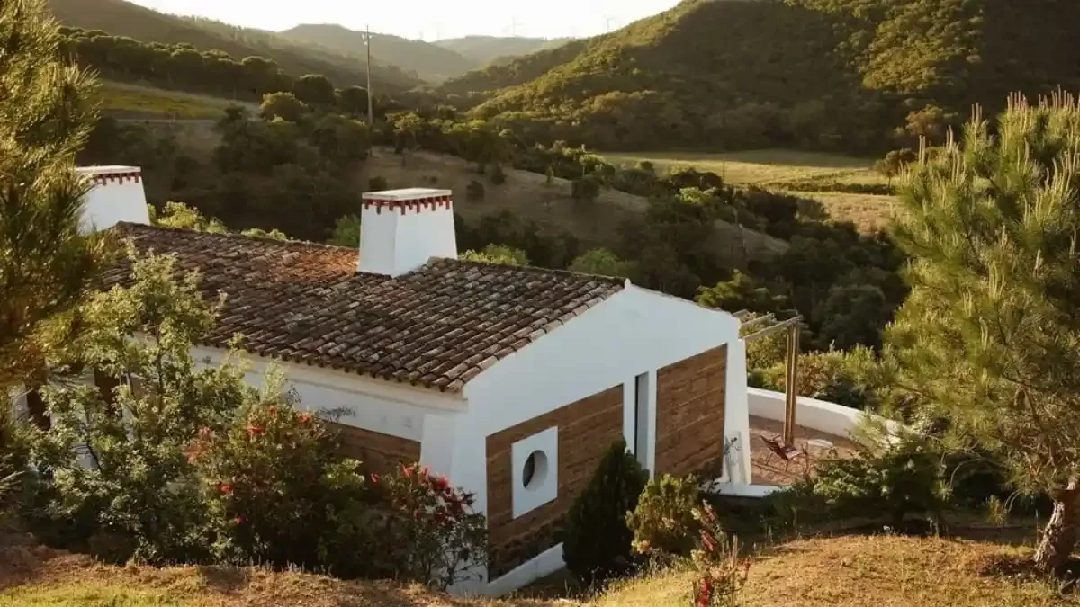 Hilltop Monte da Vilarinha cottage overlooking verdant valleys of Costa Vicentina Natural Park.