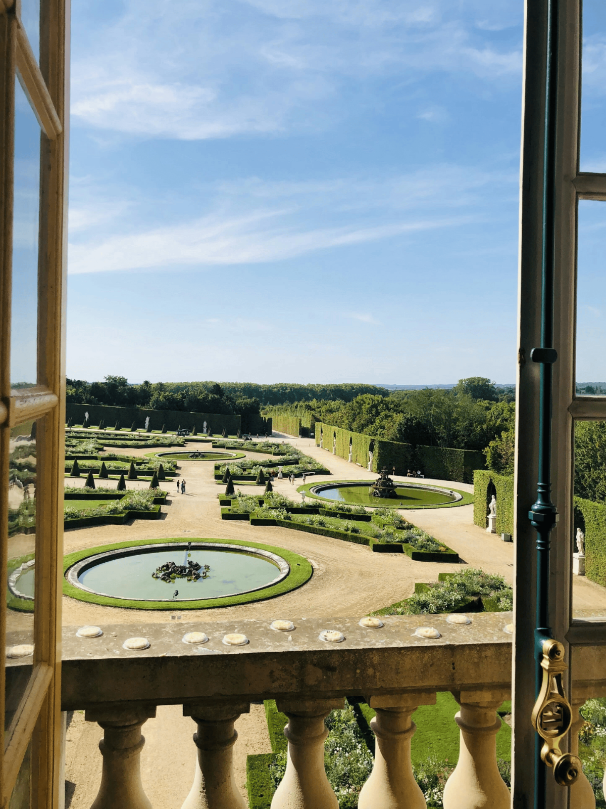 Elevated view of ornate French parterre gardens.